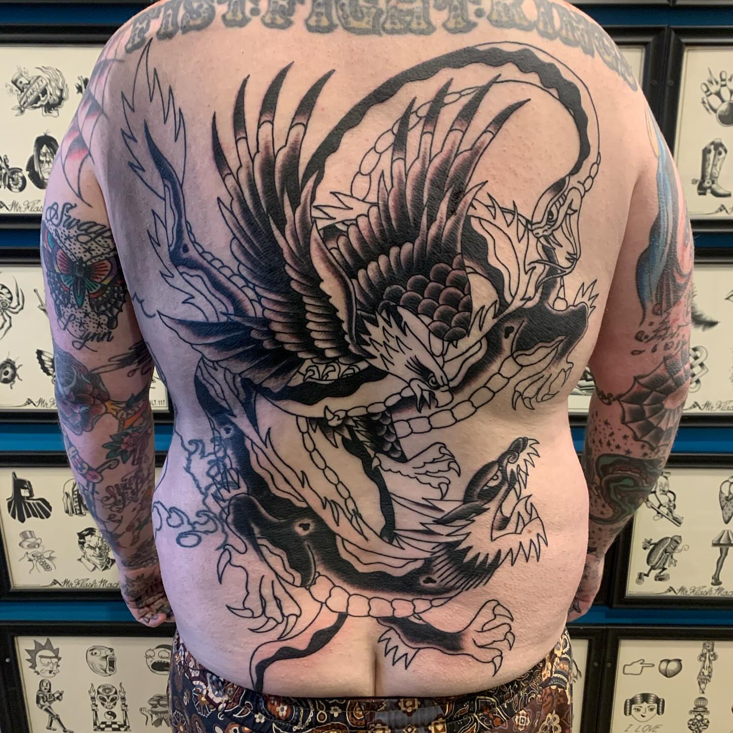 Phoenix American traditional tattoo on the back by mike_howard