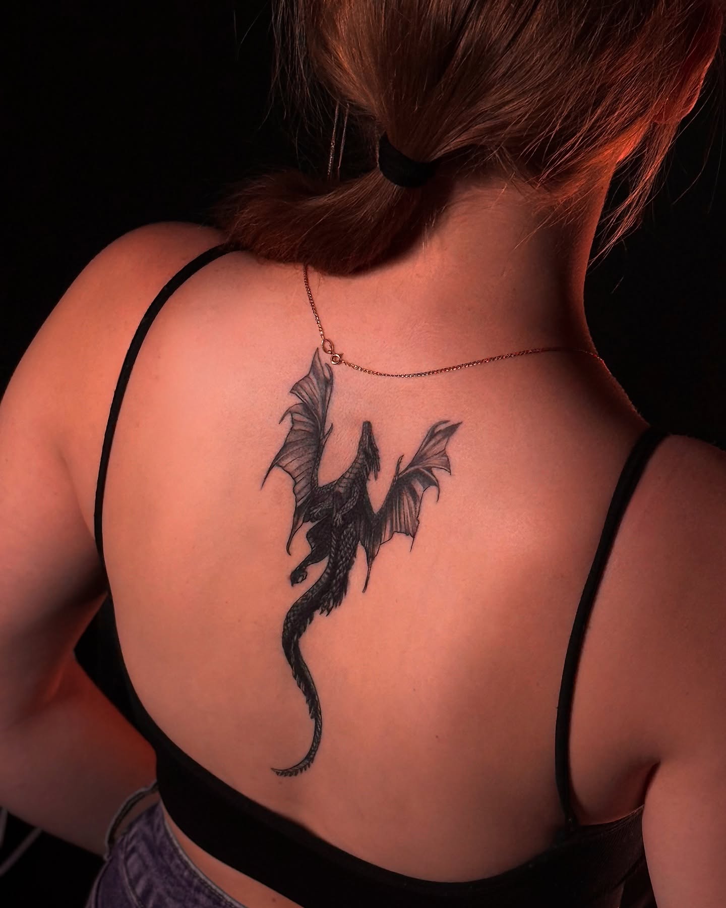 Dragon black and grey tattoo on the back by Виктория Лукьянова