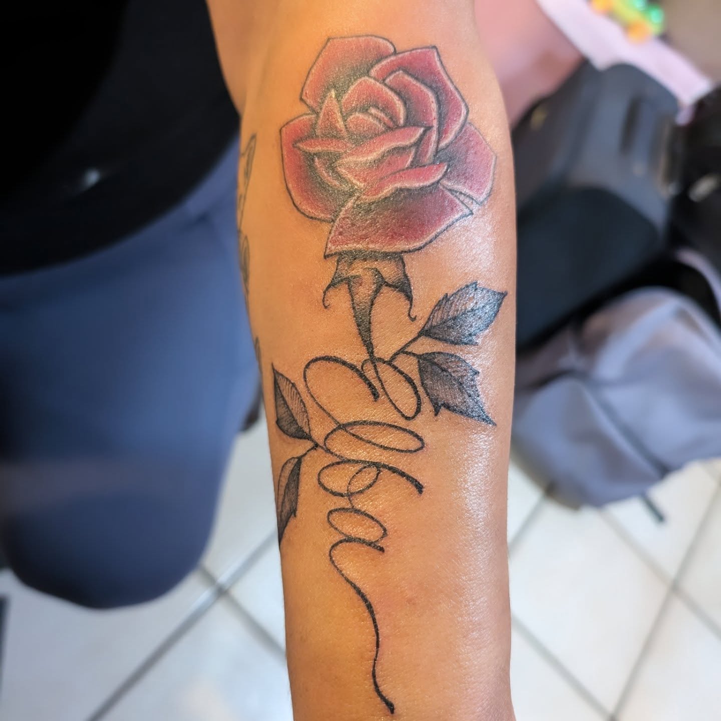 Rose realism tattoo on the forearm by Markus Hicks