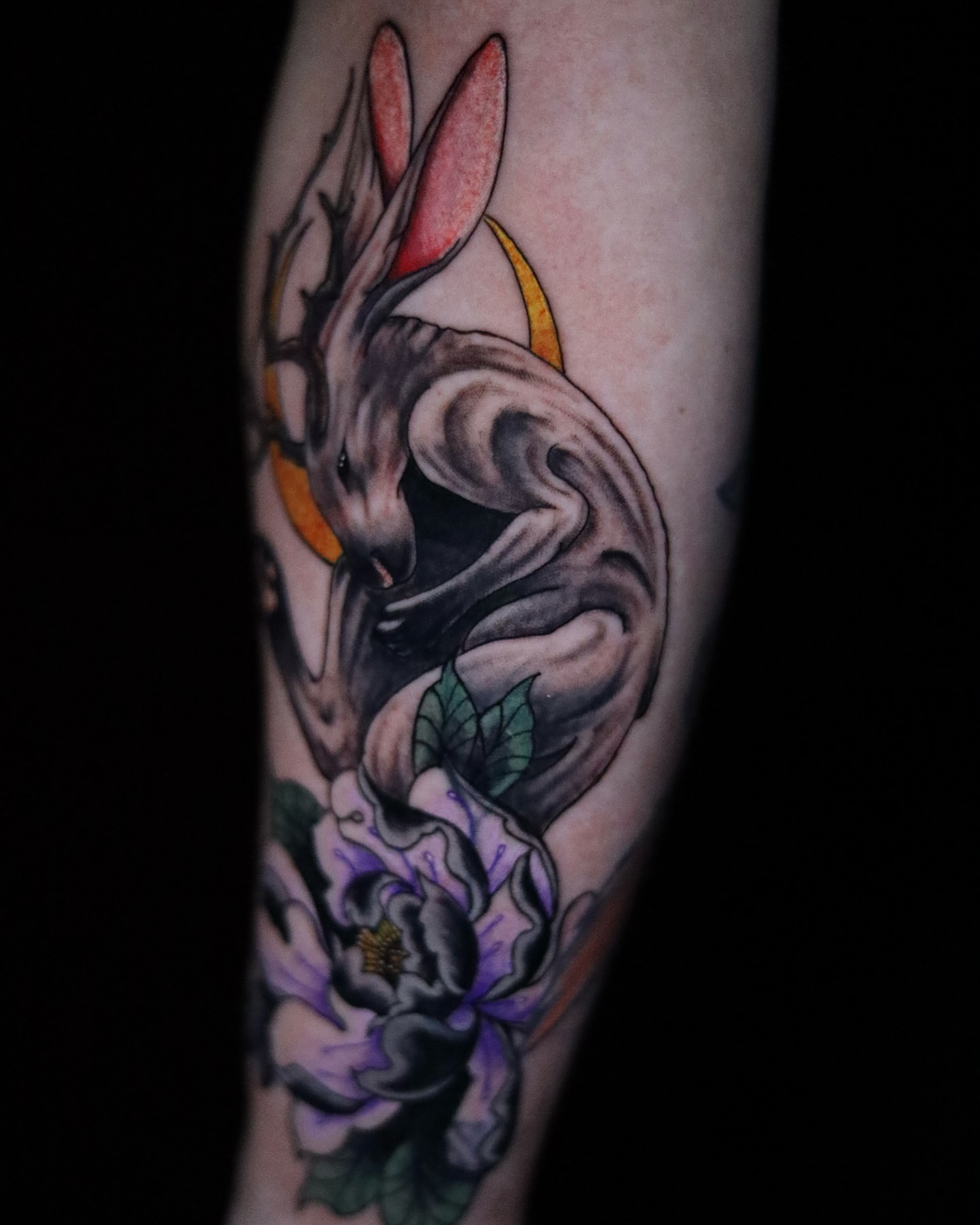 Dragon and flower neo-traditional tattoo on the forearm by Neeko