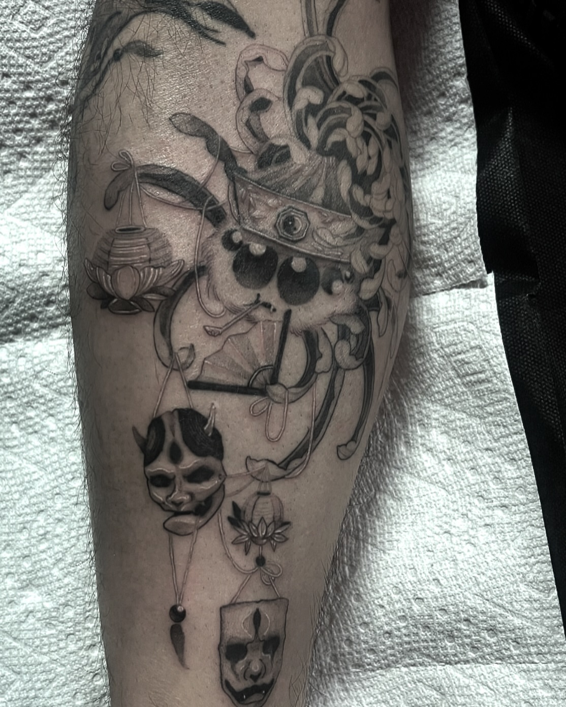 Japanese mask japanese irezumi tattoo on the forearm by Joshua Hung, Alhambra, California