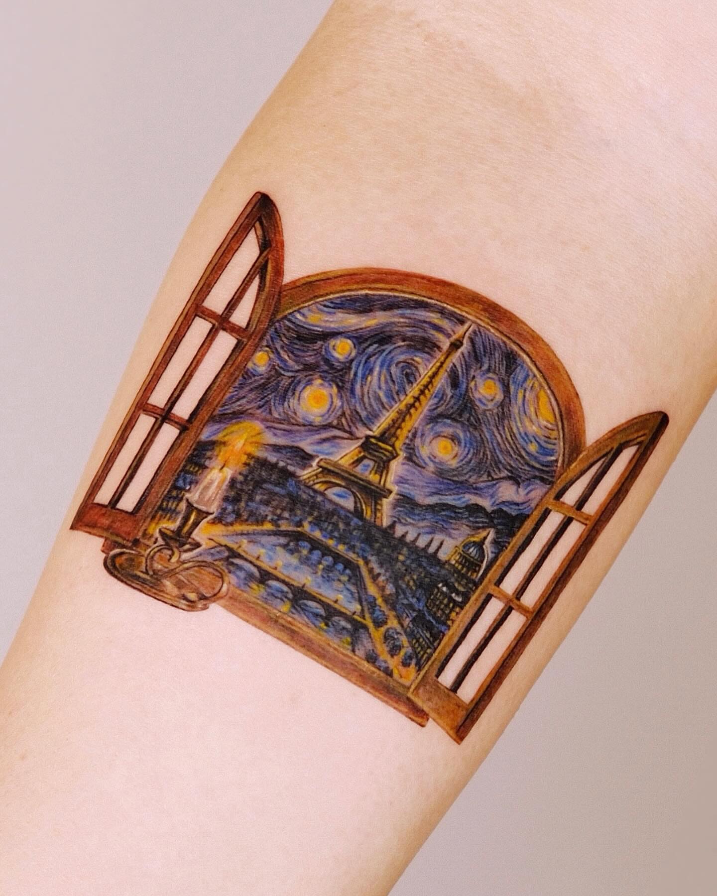 Starry night illustrative tattoo on the forearm by Yeye