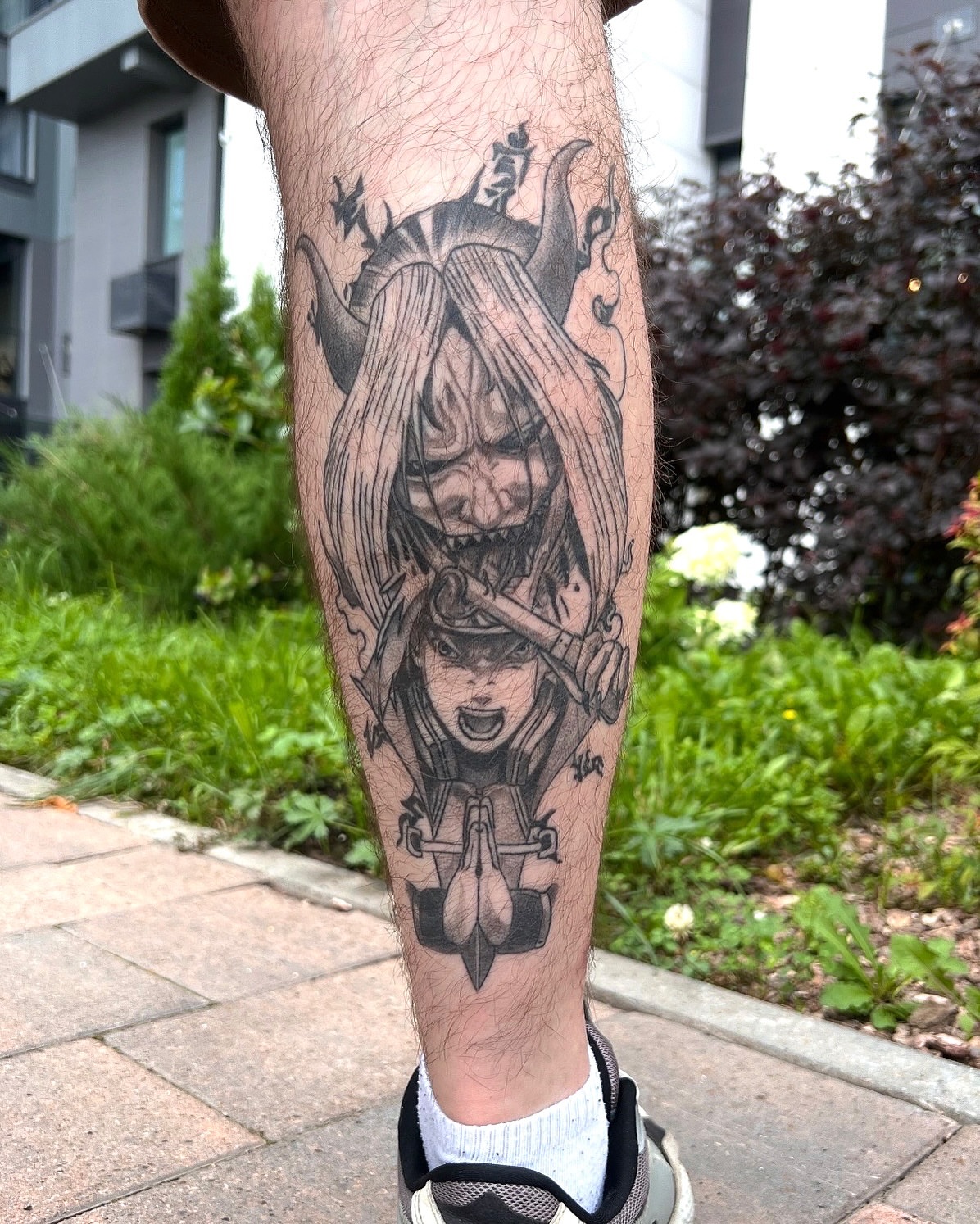 Demon and woman dark realism tattoo on the forearm by Виктория Лукьянова