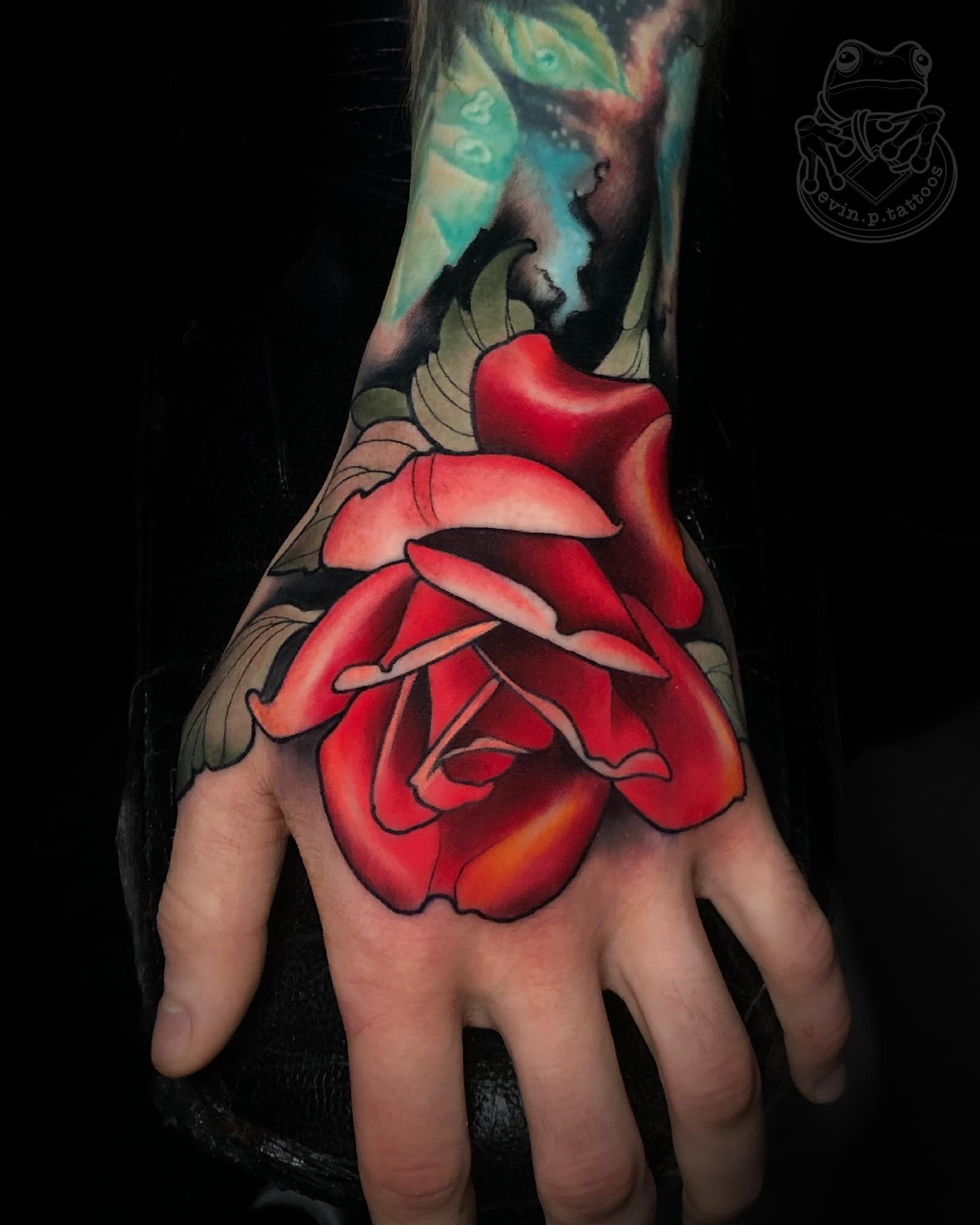 Red rose realism tattoo on the hand by Evin Pfaff, Bedford, Pennsylvania