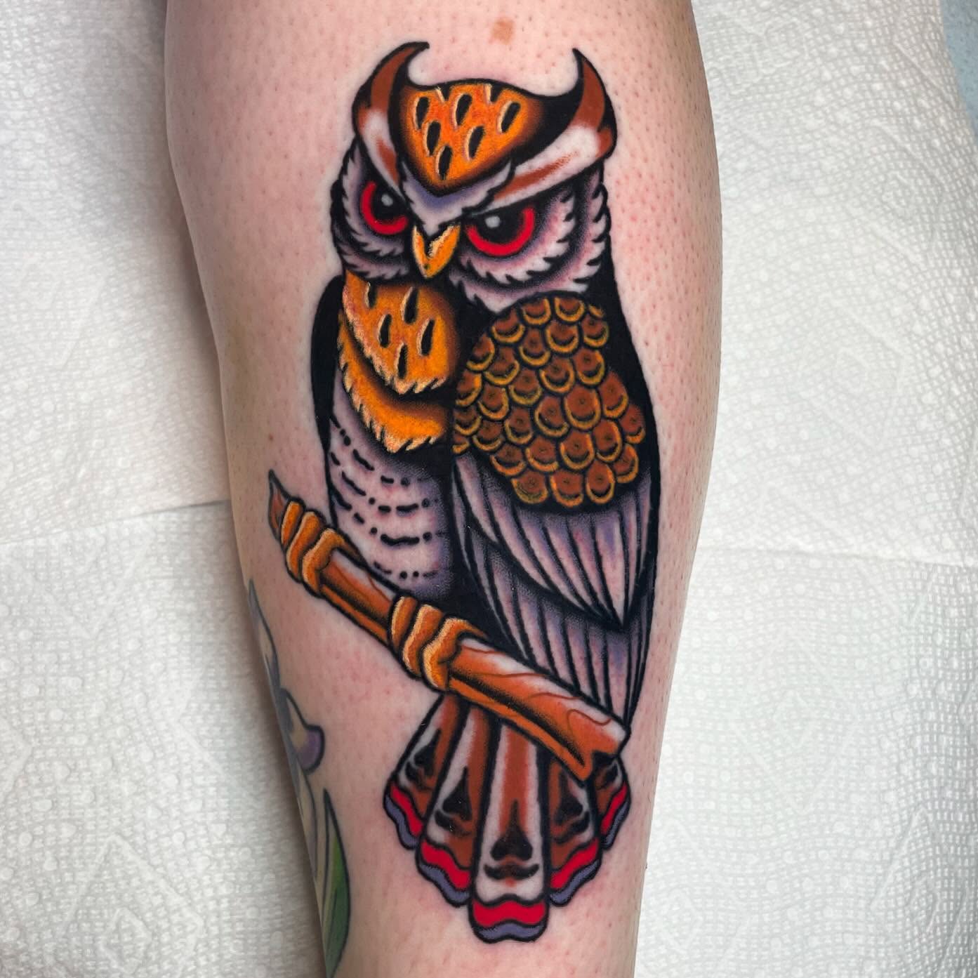 Owl American traditional tattoo on the forearm by Nova Vaughn