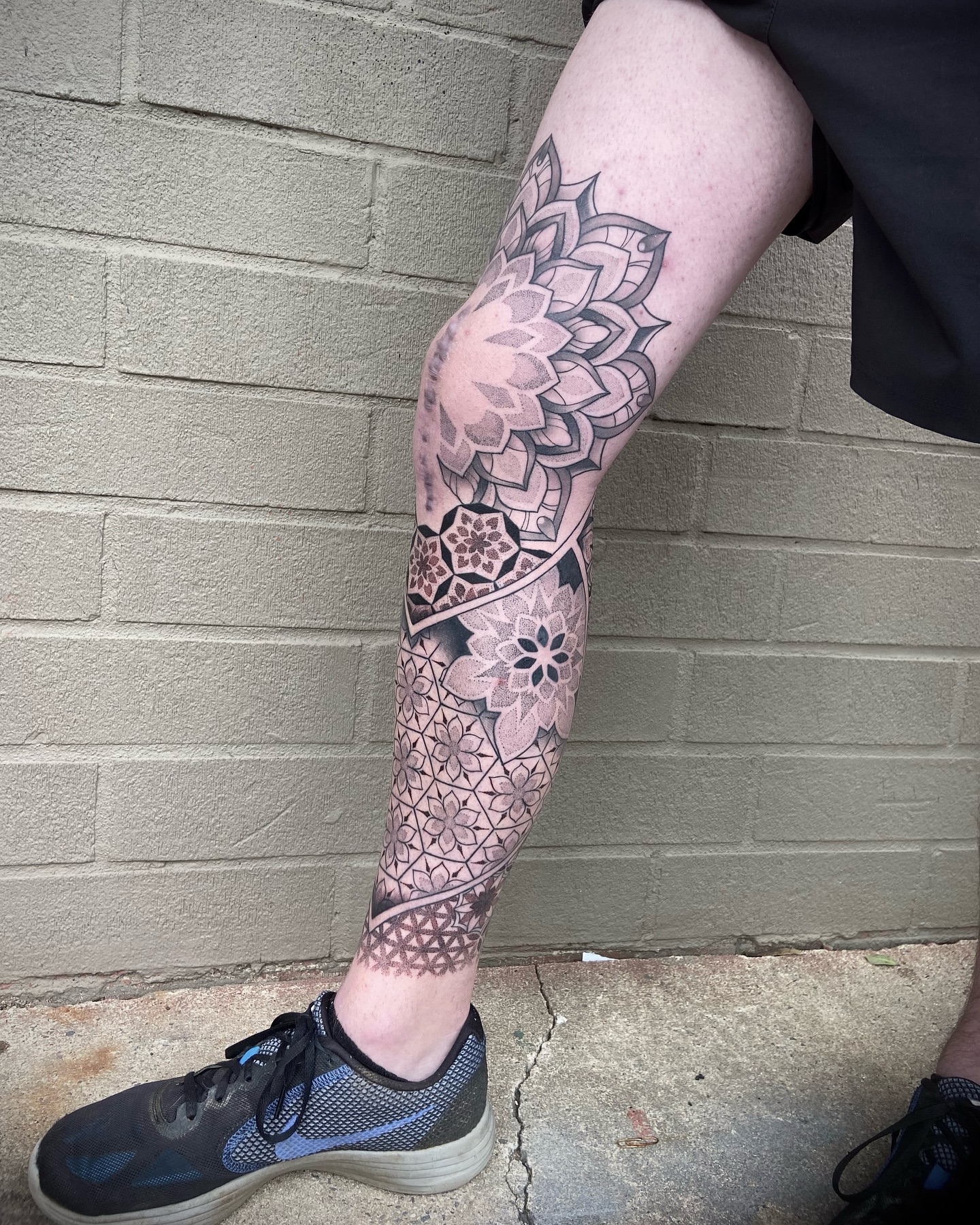 Geometric patterns geometric tattoo on the calf by Zac Byrd