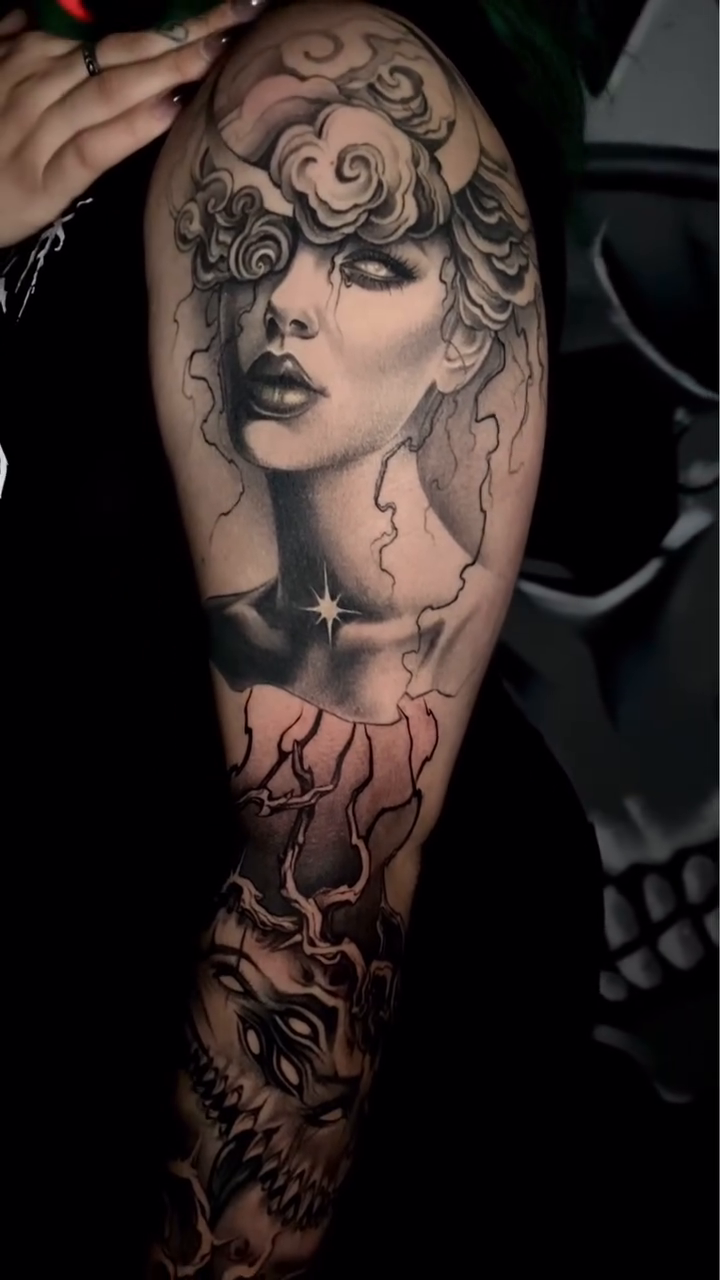 Woman and demonic faces realism tattoo by Las Vegas tattoo Artist