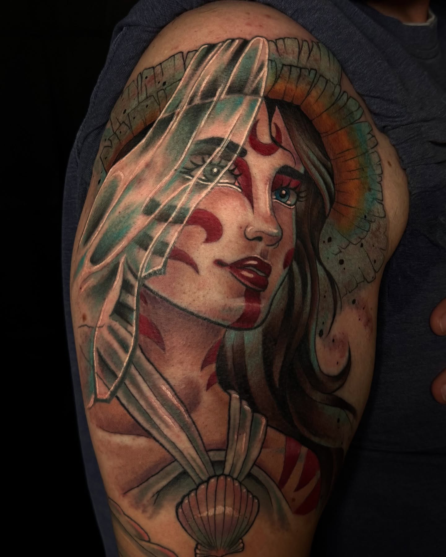 Woman with headdress American traditional tattoo on the upper arm by Mags🗡️