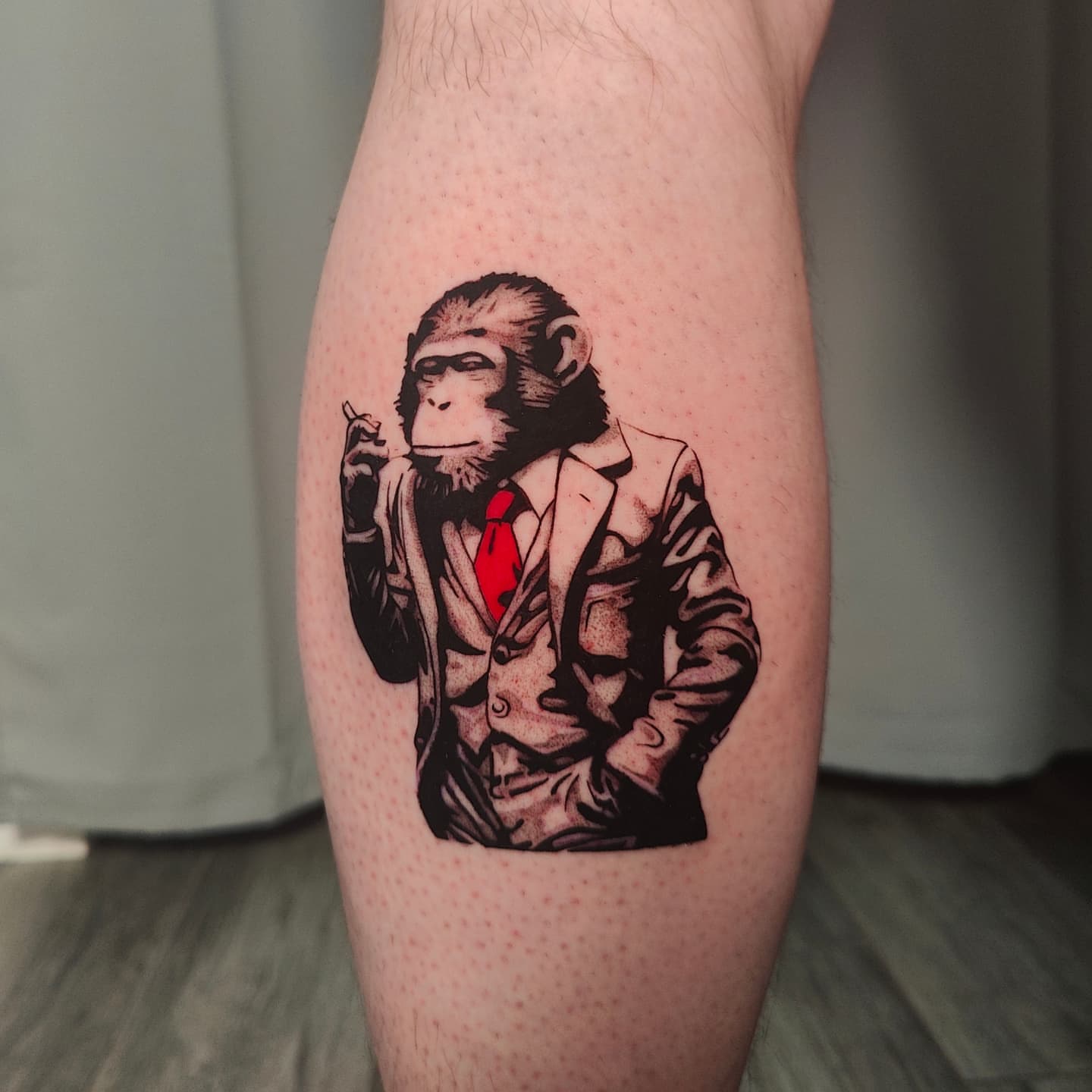 Monkey in suit dotwork tattoo on the forearm by Ｔｏｍ Ｌｏｒａｎｚ