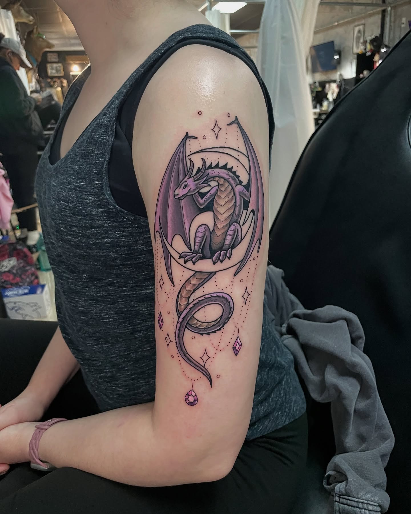 Dragon dotwork tattoo on the forearm by Candence Smith