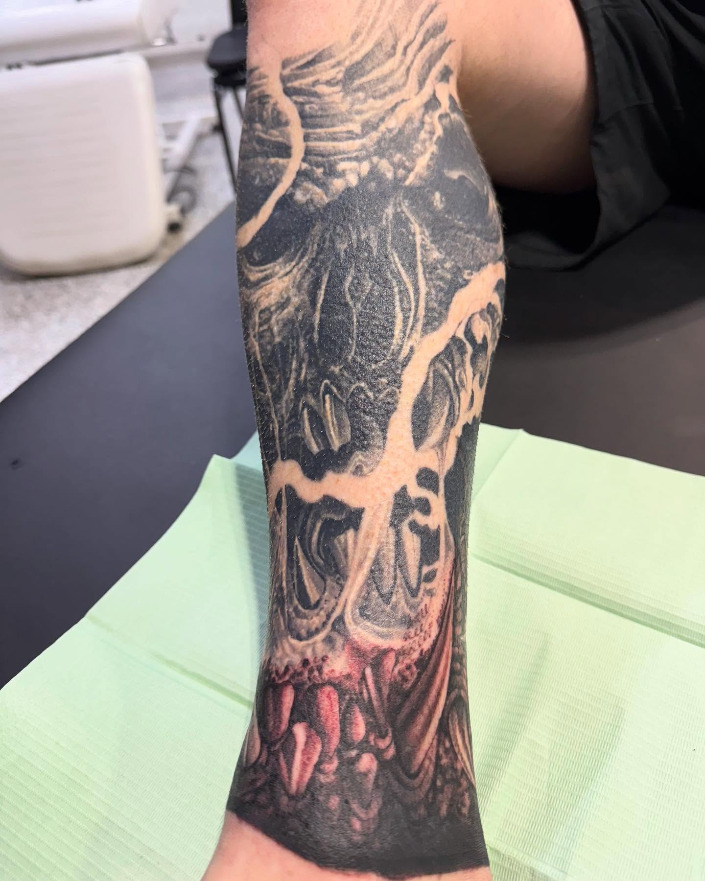 Abstract tree dark realism tattoo on the forearm by Troy Butner