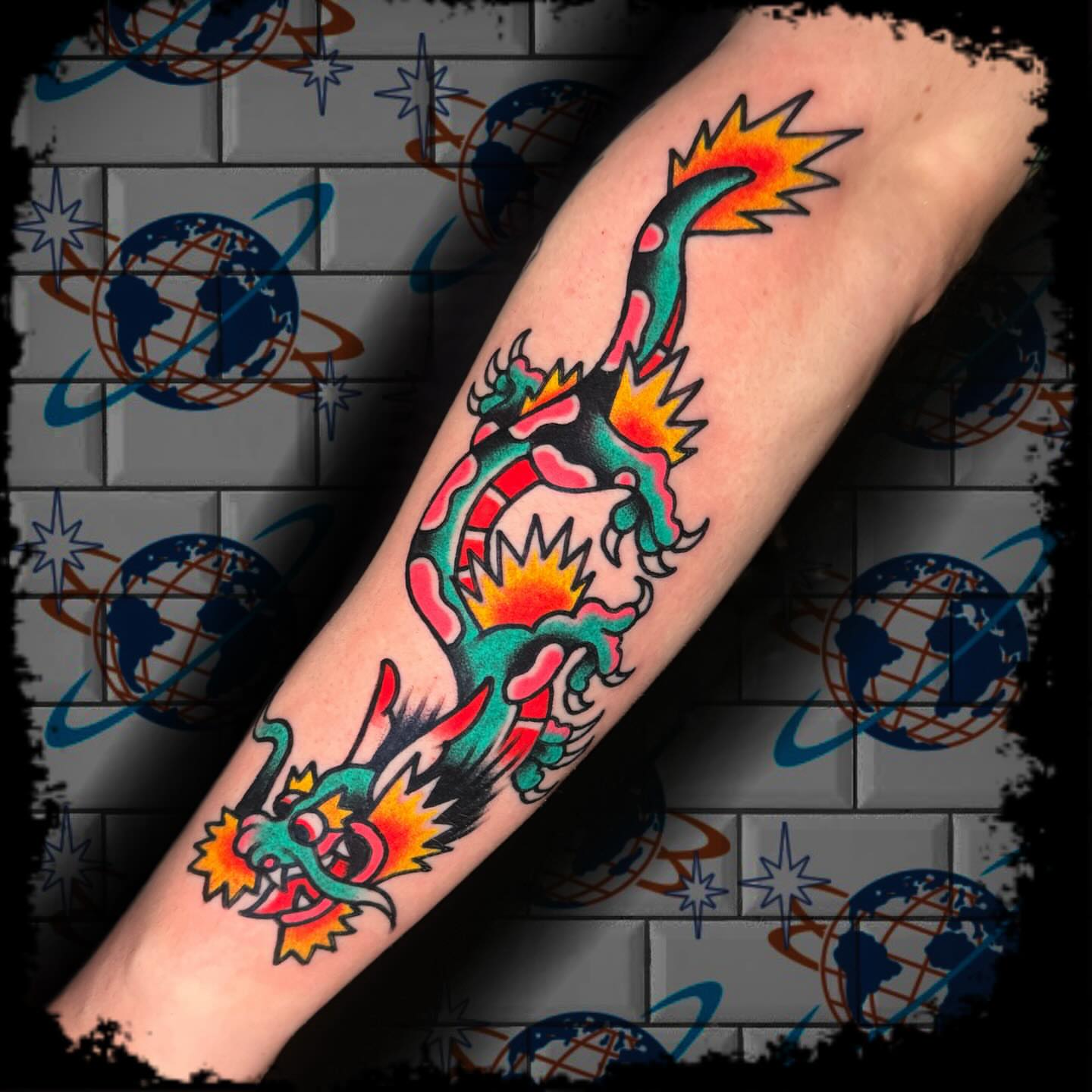 Dragon American traditional tattoo on the forearm by Antonio DeCaro