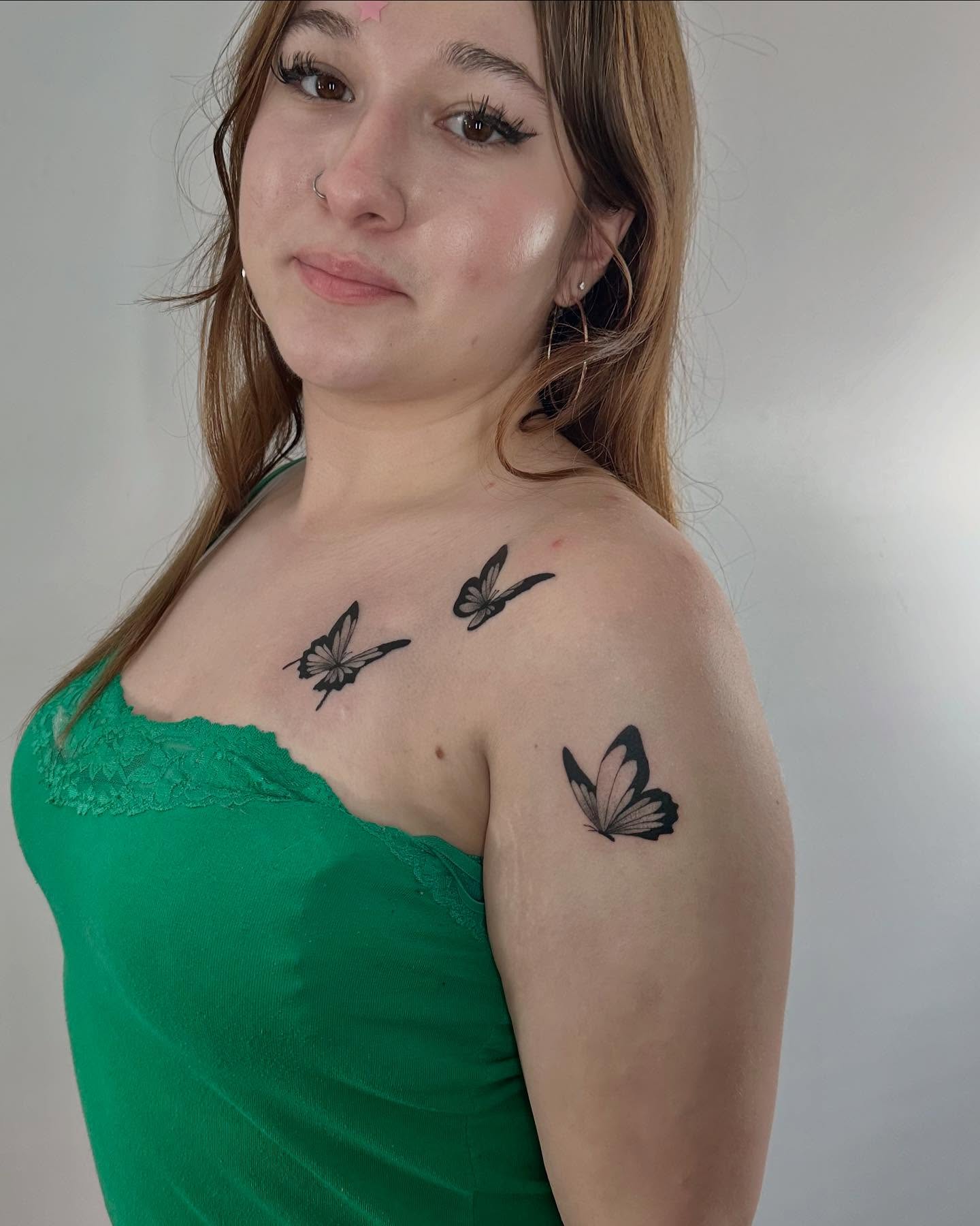Butterflies black and grey tattoo on the shoulder by Felipe Pacifico