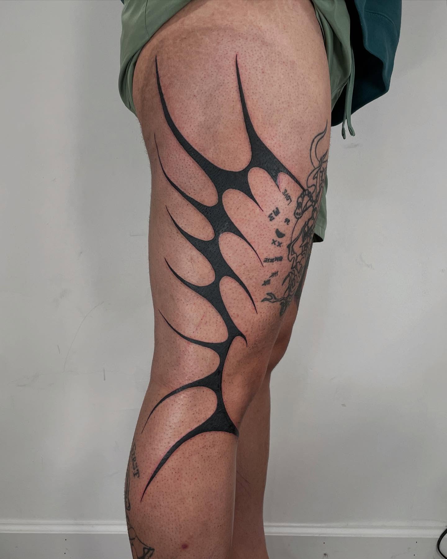 Antlers tribal tattoo on the thigh by sarah ✶