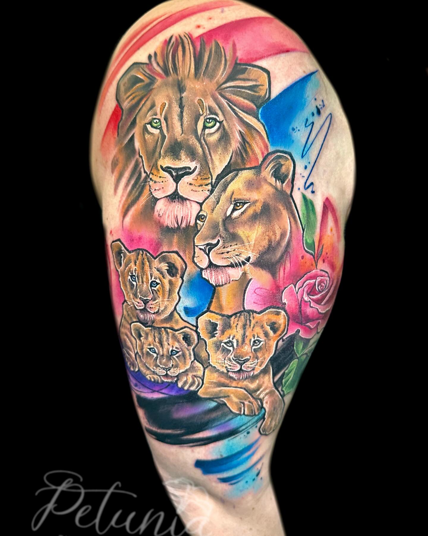 Lion family realism tattoo on the forearm by Alena Petunia