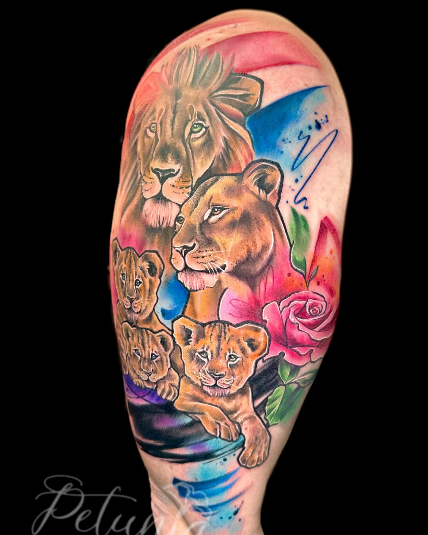 Lion family realism tattoo on the forearm by Alena Petunia