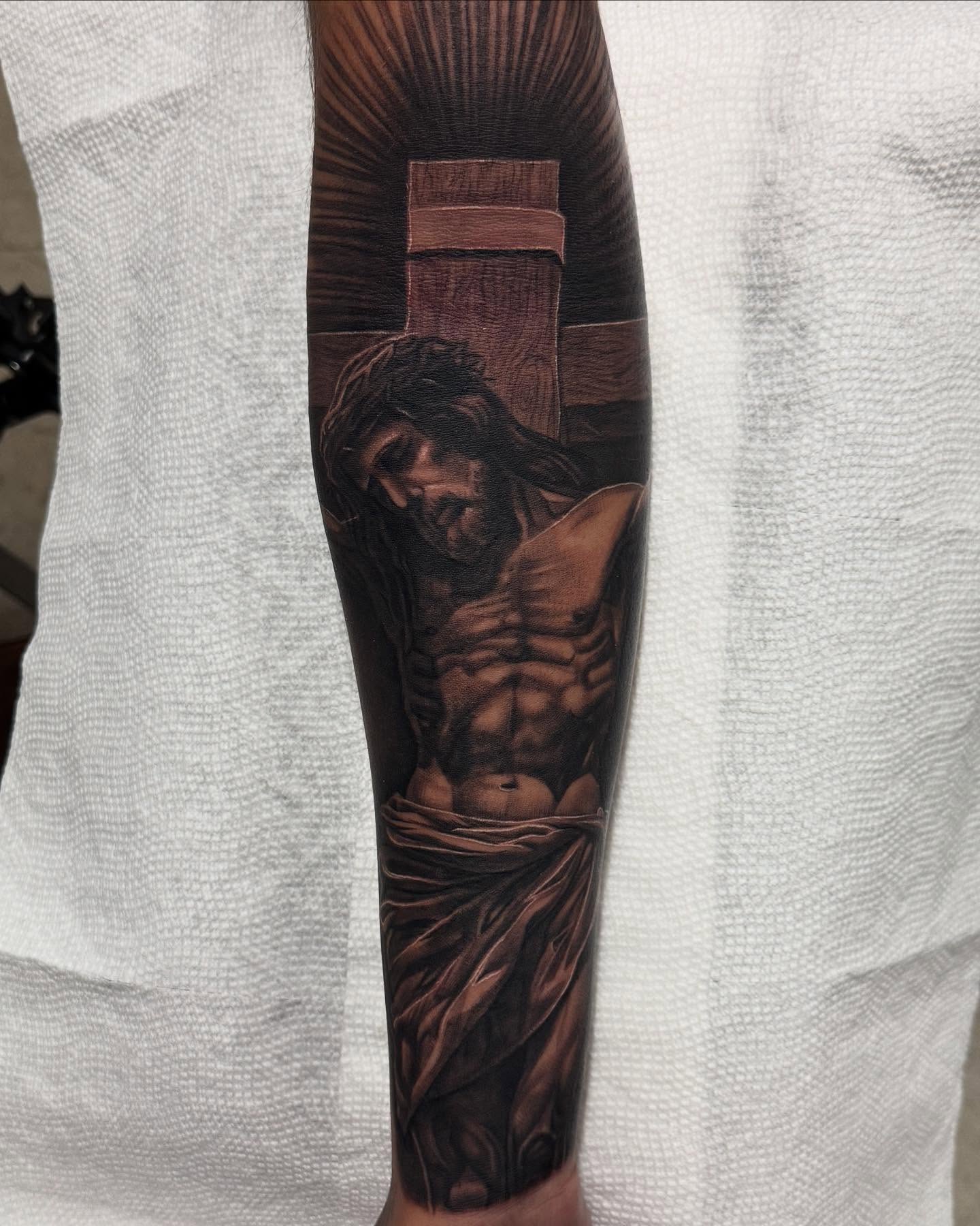 Jesus Christ realism tattoo on the forearm by Anthony Duran
