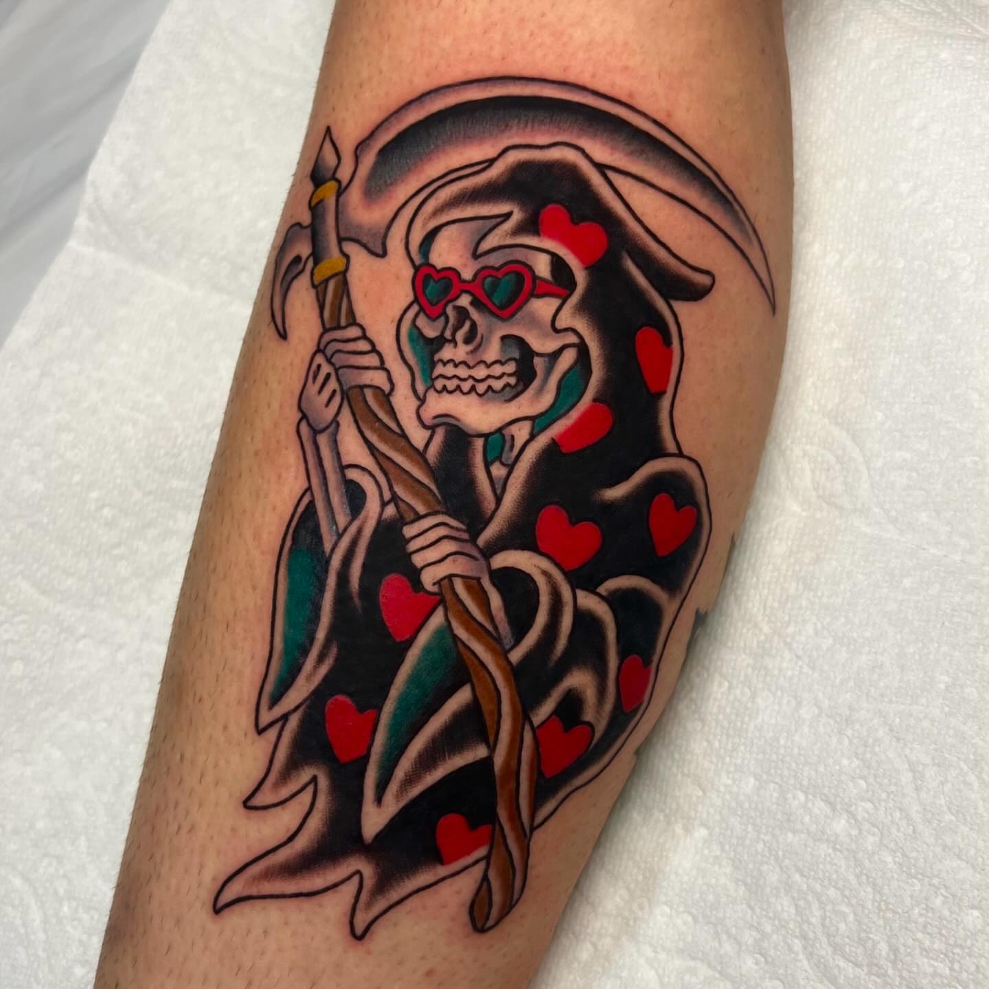 Grim reaper American traditional tattoo on the forearm by Brandon Mizrahi