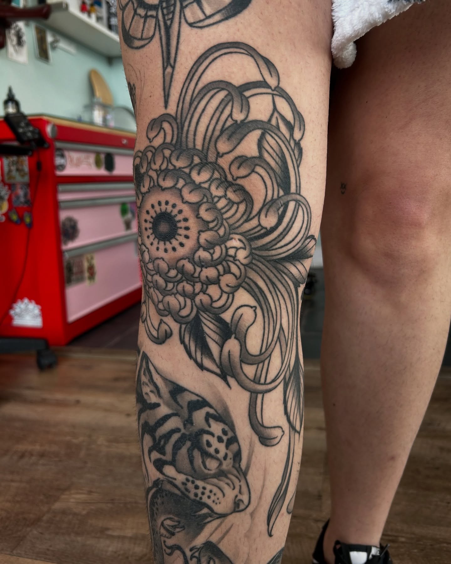 Chrysanthemum black and grey tattoo on the forearm by Lilly Binns