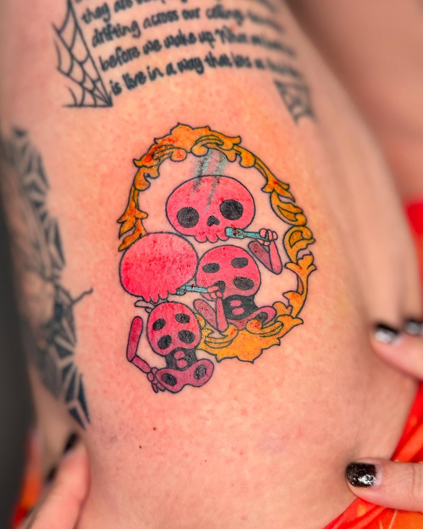 Skull and mushrooms trash polka tattoo on the upper arm by Sophie ✨ Nashville Tattoo Artist ✨