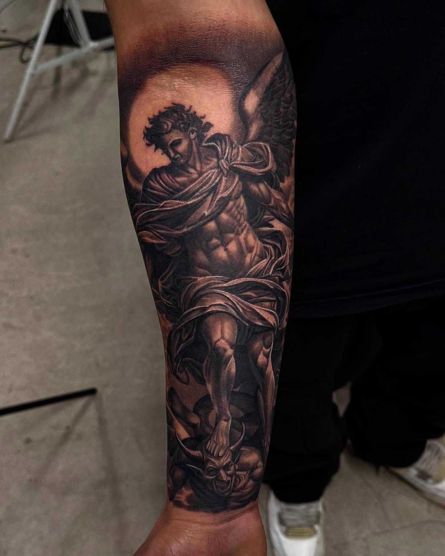 Angel realism tattoo on the forearm by Anthony Duran