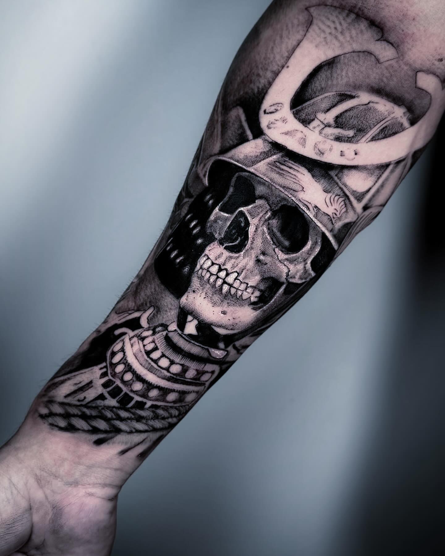 Skull and gear realism tattoo on the forearm by Tattoo Ottawa