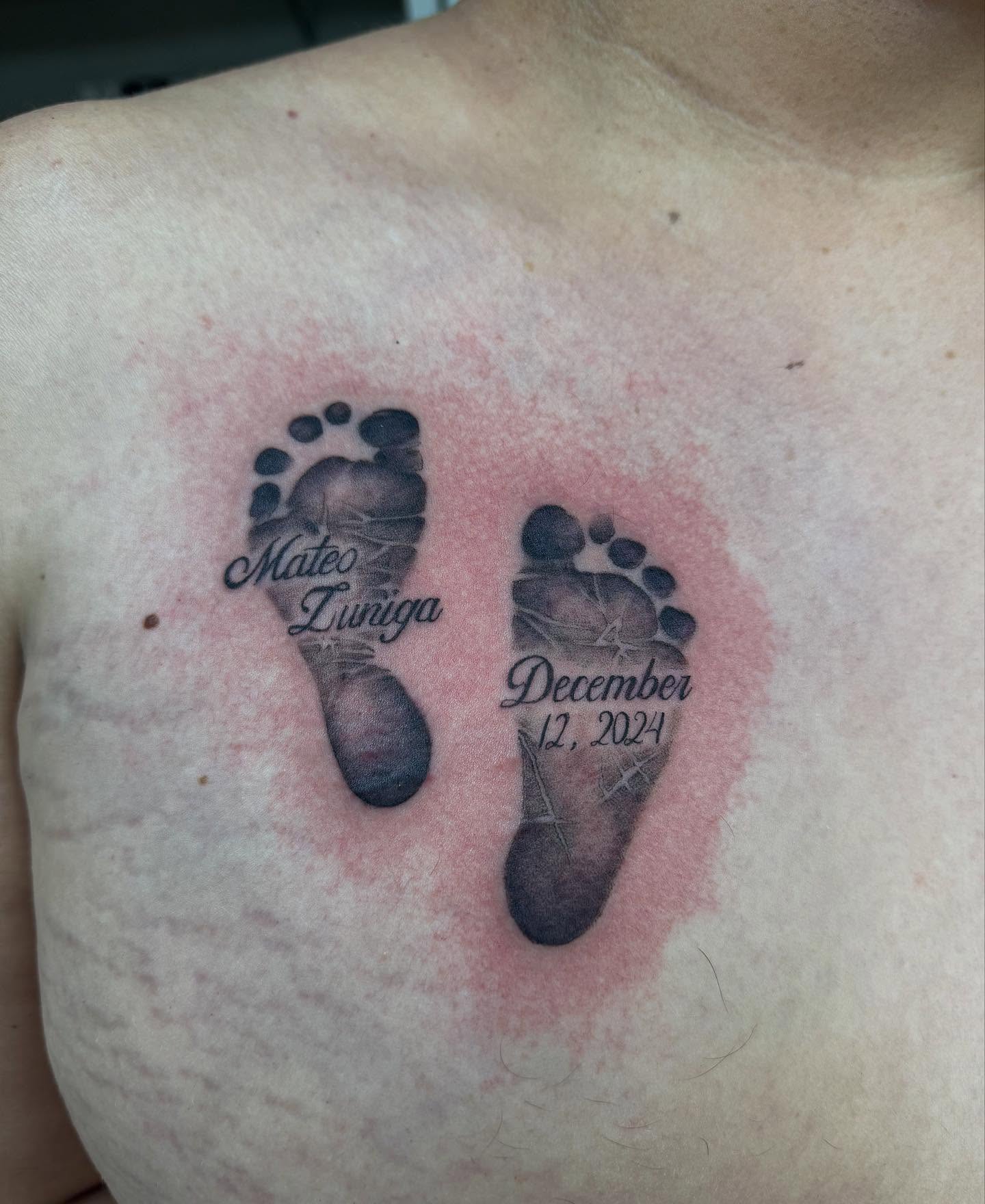 Footprints black and grey tattoo on the chest by Mo Dinero🎰