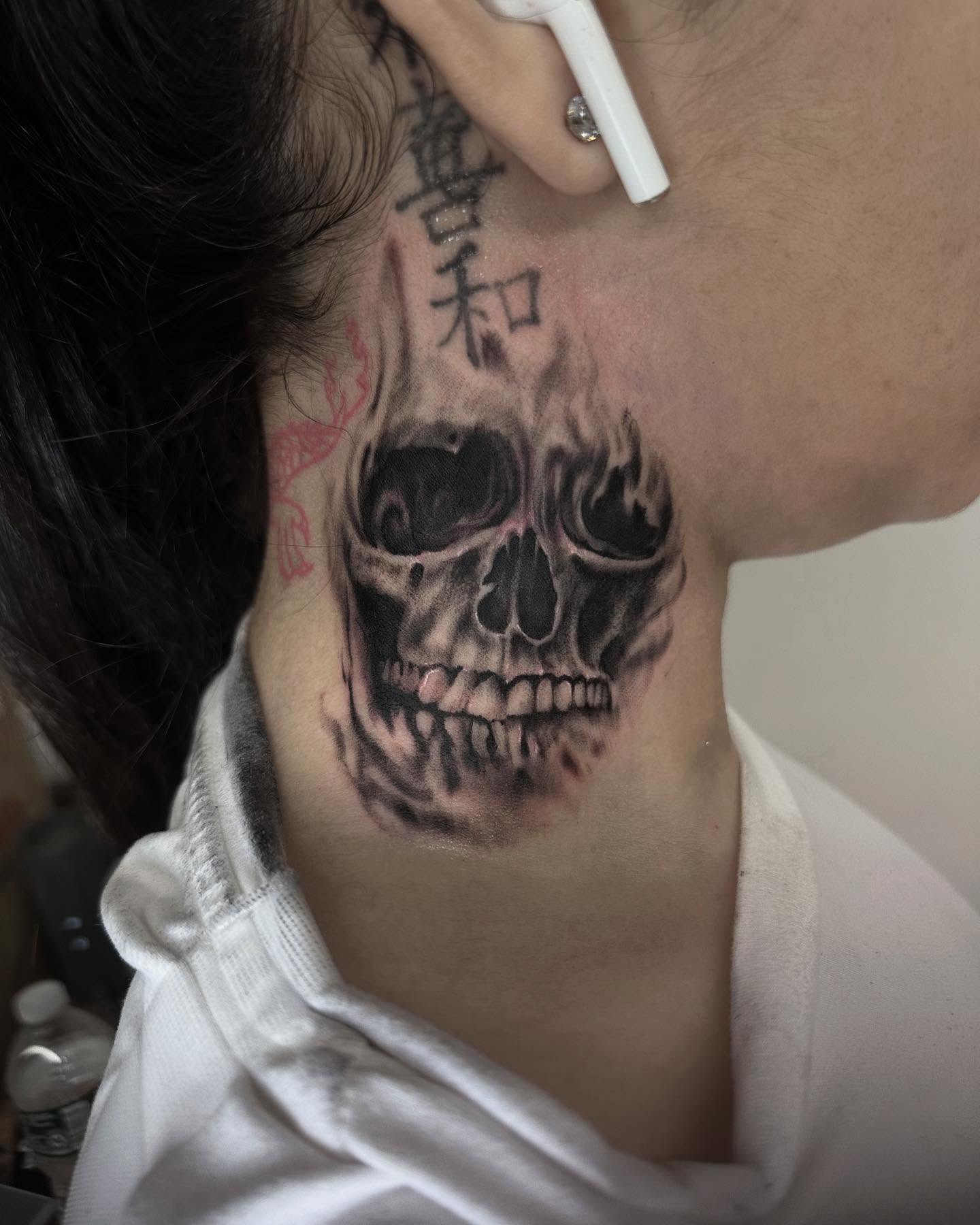Skull realism tattoo on the neck by ⠀Joey Rosado