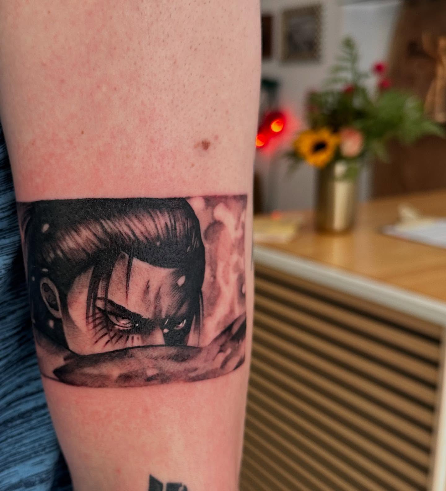 Anime character anime tattoo on the forearm by Abigail Townsend