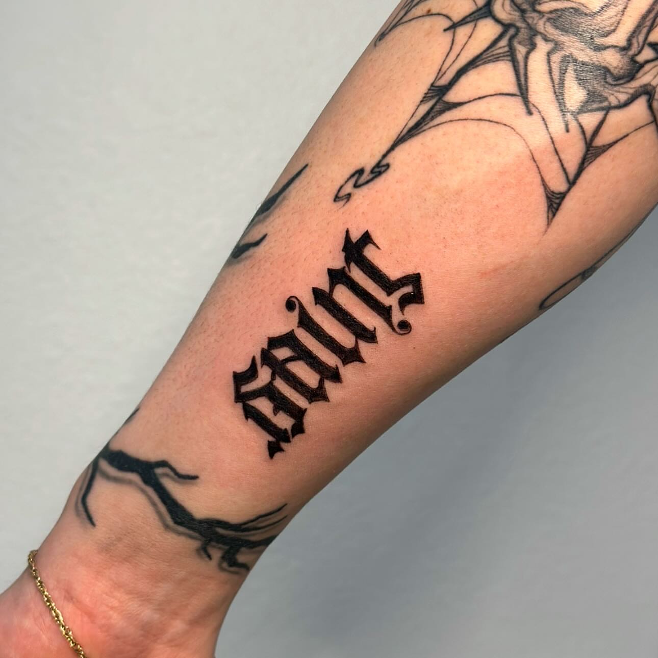 String lettering script tattoo on the forearm by πΎππ π π·ππ πππππ πΏπππππ π¬πππππ