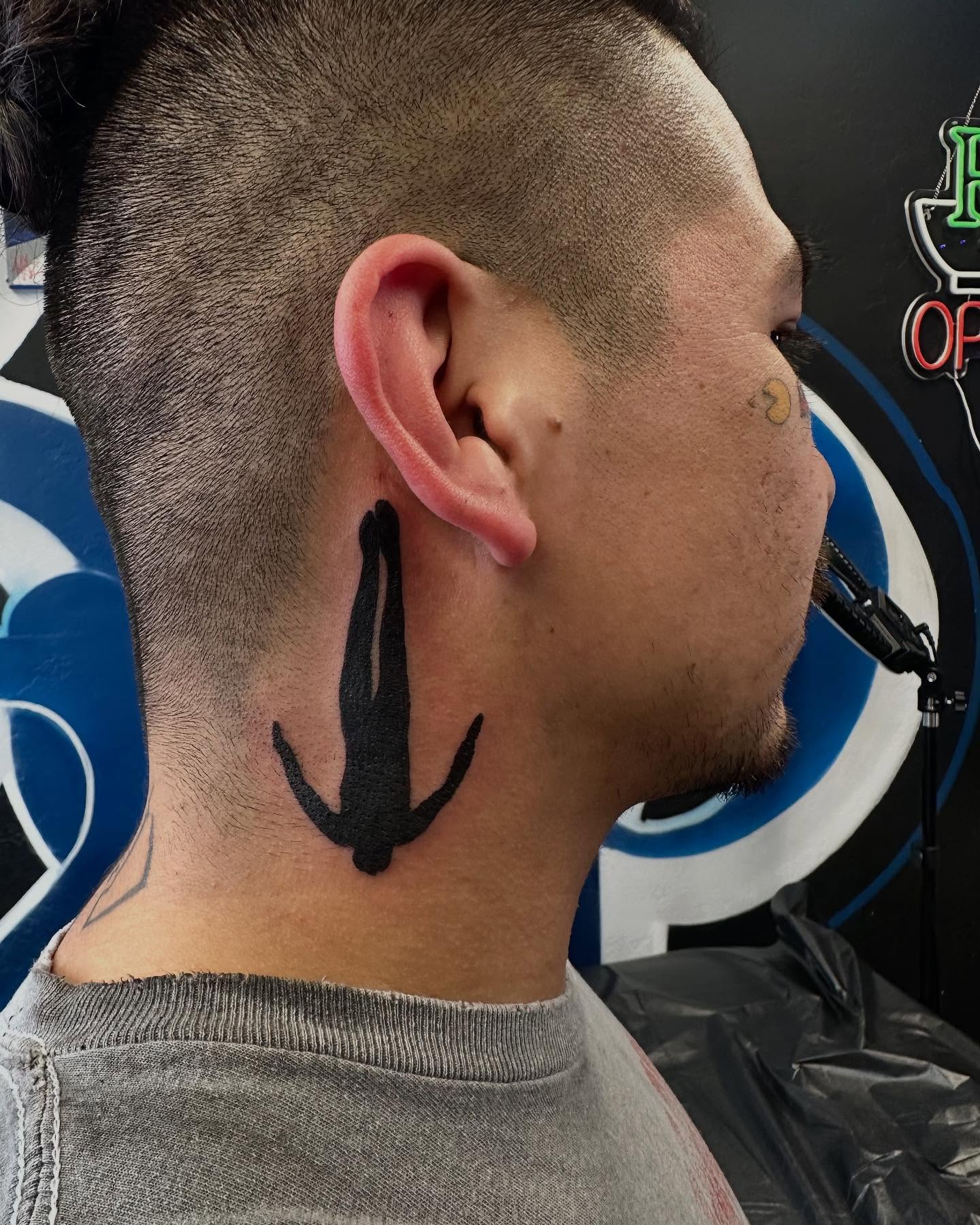 Anchor black and grey tattoo on the neck by Kimberly landin