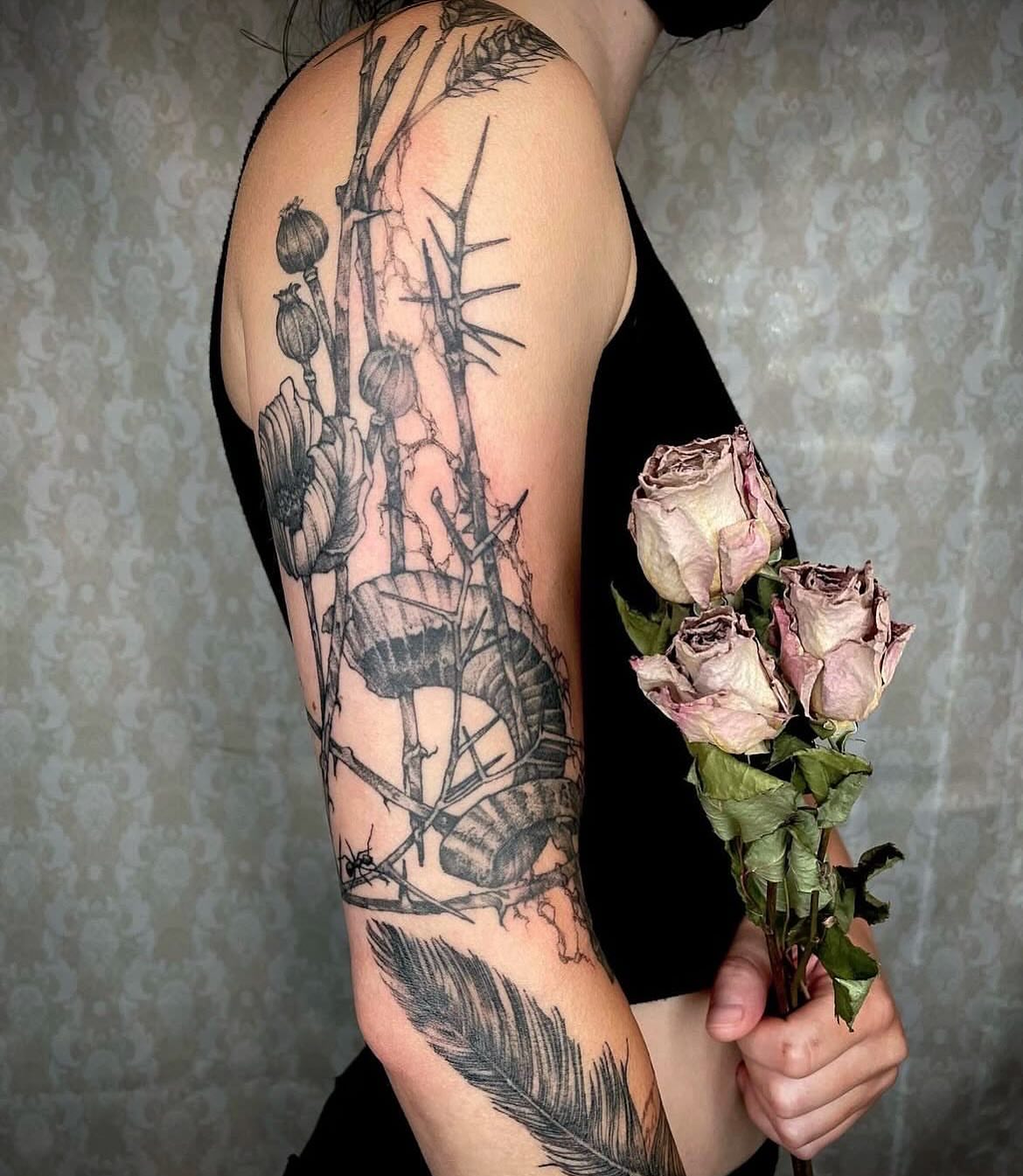 Dry roses and thorns realism tattoo on the forearm by Jamie Draven 🐺