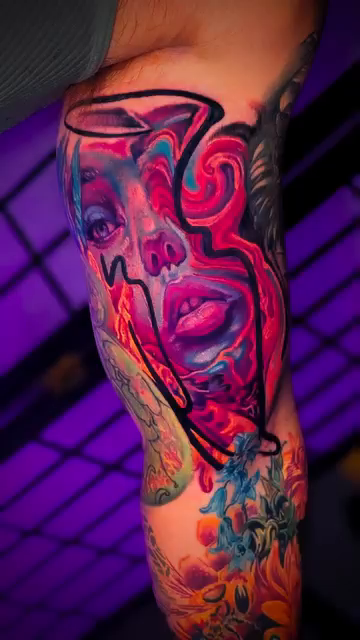 Surreal portrait neo-traditional tattoo by Colorful Tattoos by Cody Dean