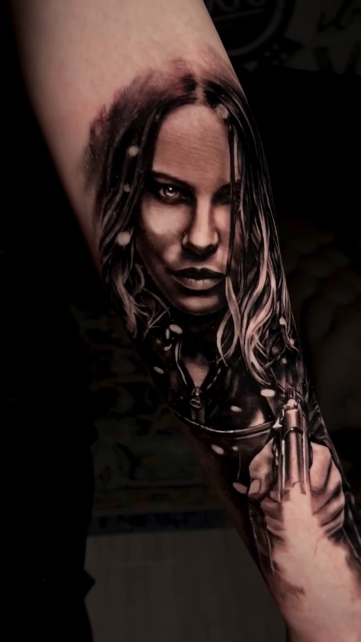 Woman with sword realism tattoo by Claude Steven Estrada, Las Vegas, Nevada