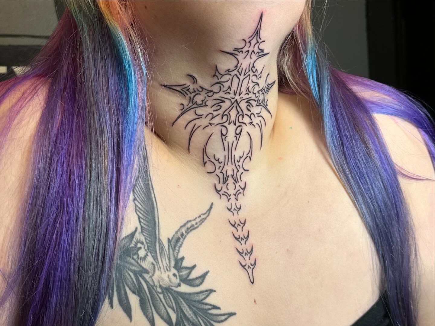 Floral cross black and grey tattoo on the chest by Kerri Colello Sittenauer
