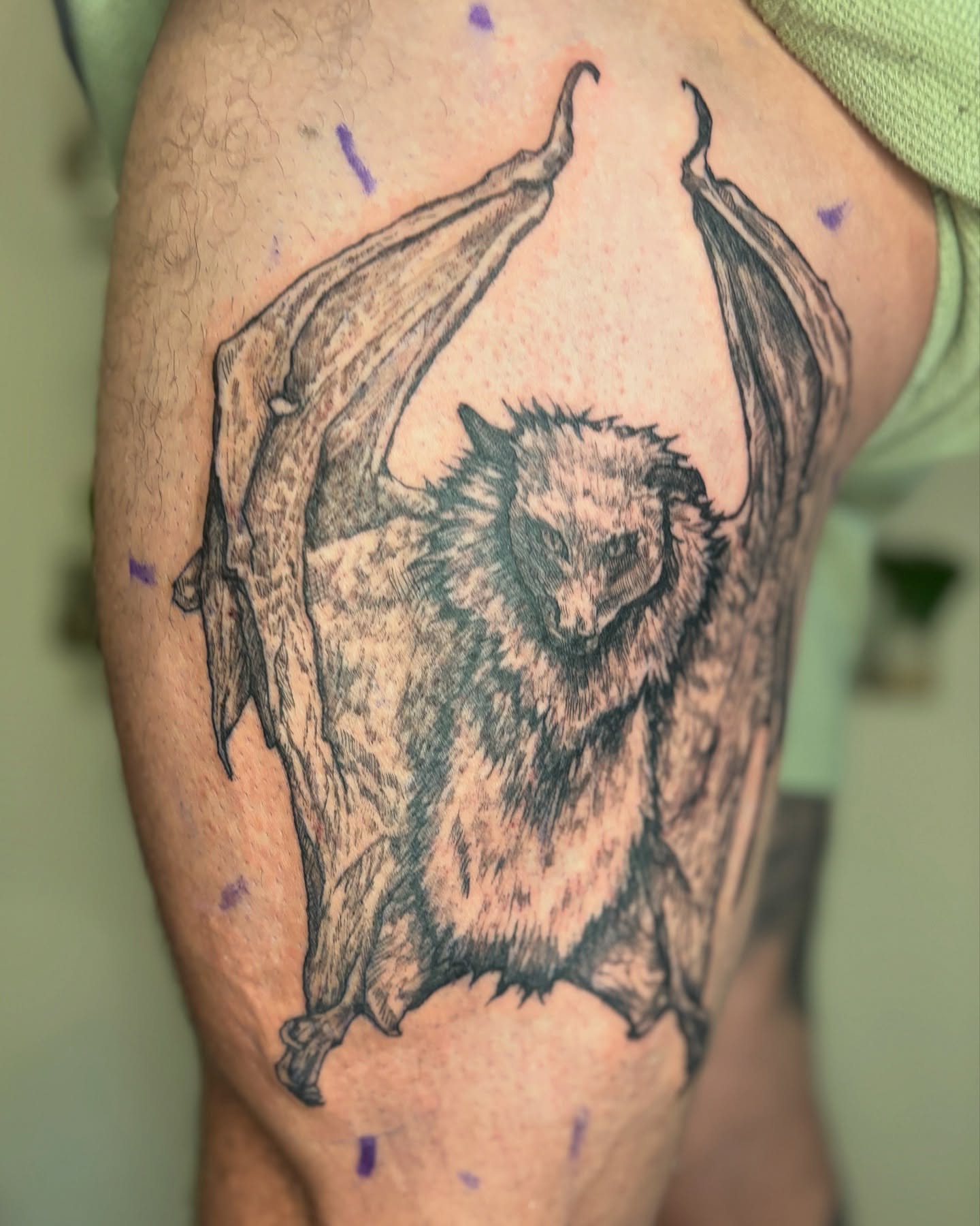 Bat black and grey tattoo on the thigh by Wren Cavanaugh Tattoos, Seattle, Washington