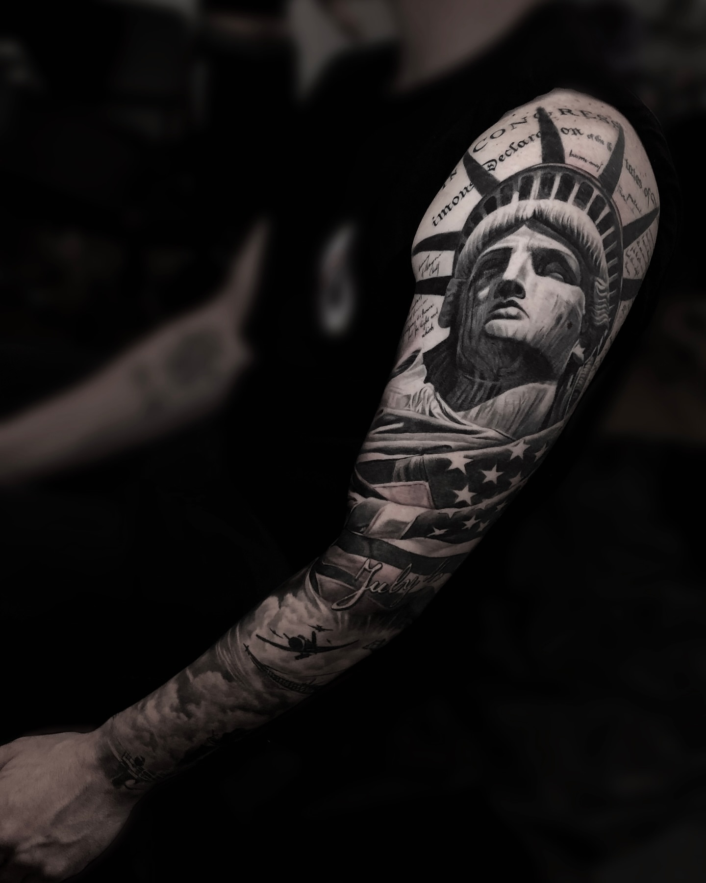 Statue of liberty realism tattoo on the forearm by Lynn Hoang, Honolulu, Hawaii