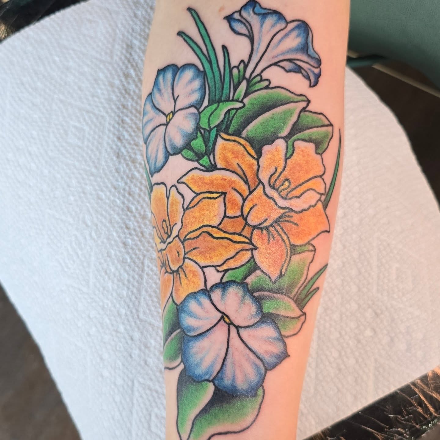 Floral bouquet new school tattoo on the forearm by Columbus tattoo artist