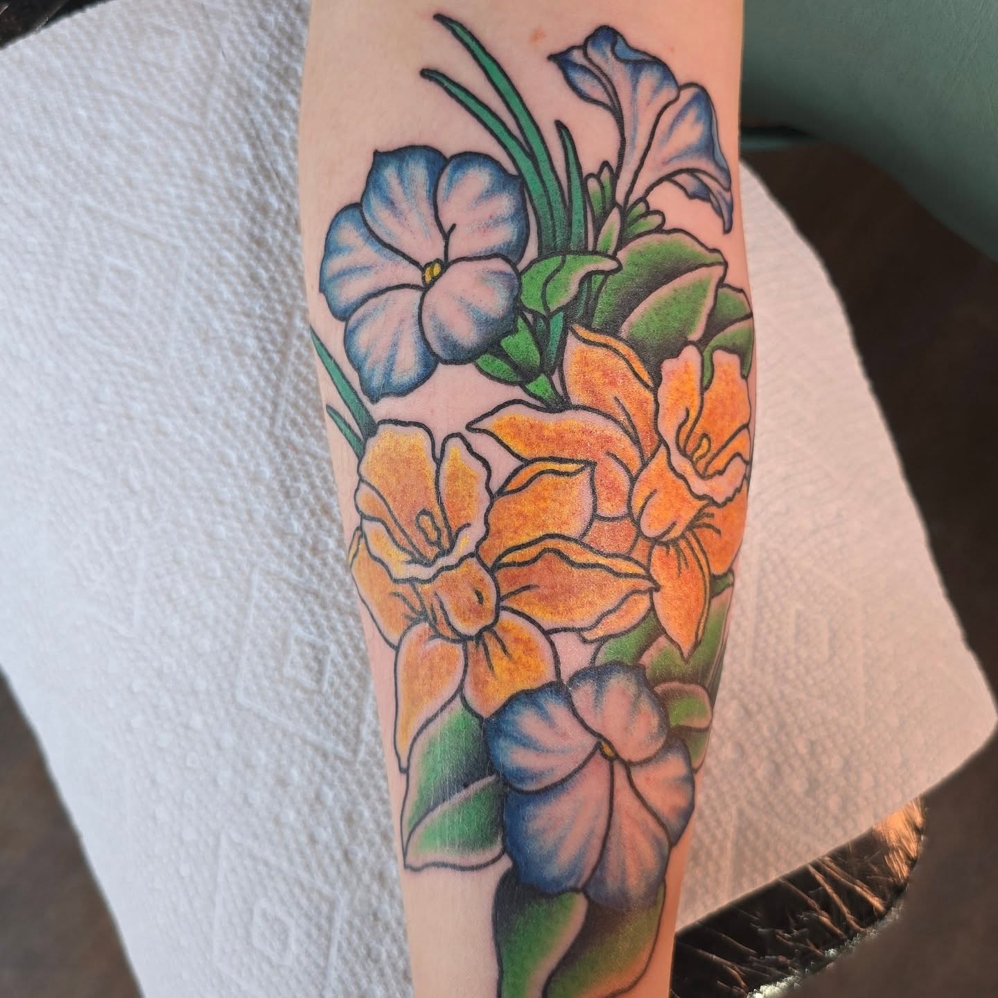 Floral bouquet new school tattoo on the forearm by Columbus tattoo artist