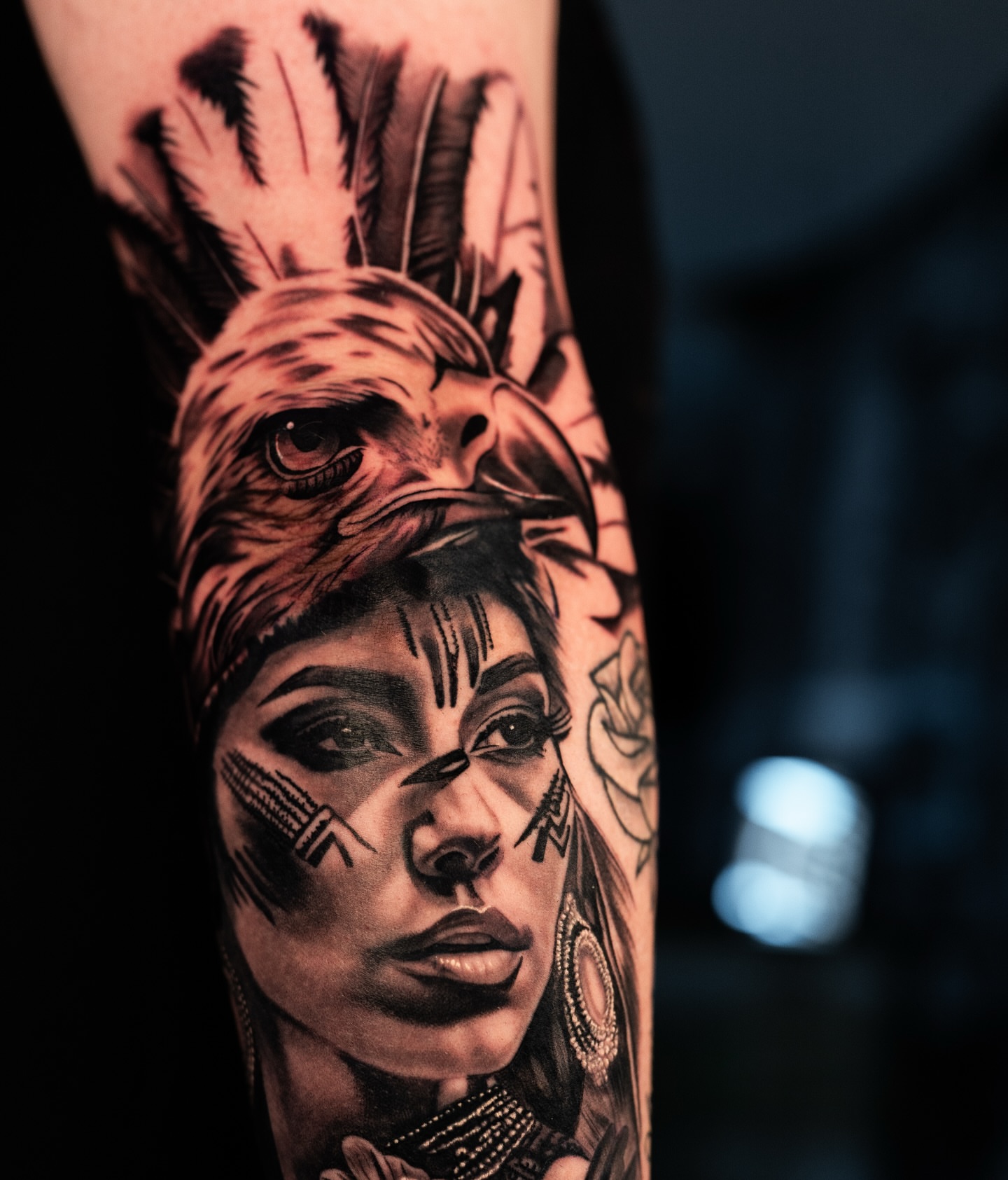 Woman with eagle realism tattoo on the forearm by Natalie Shaw