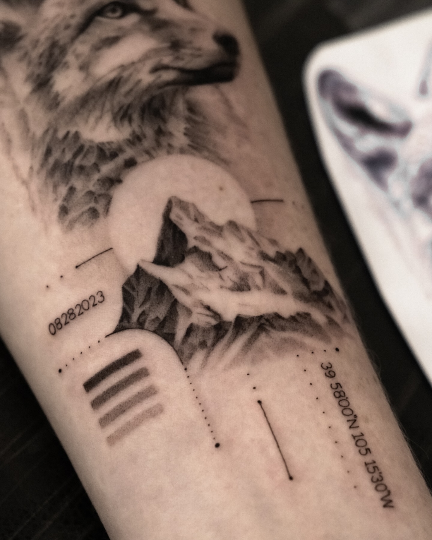 Fox and mountain realism tattoo on the forearm by Riley K Turner