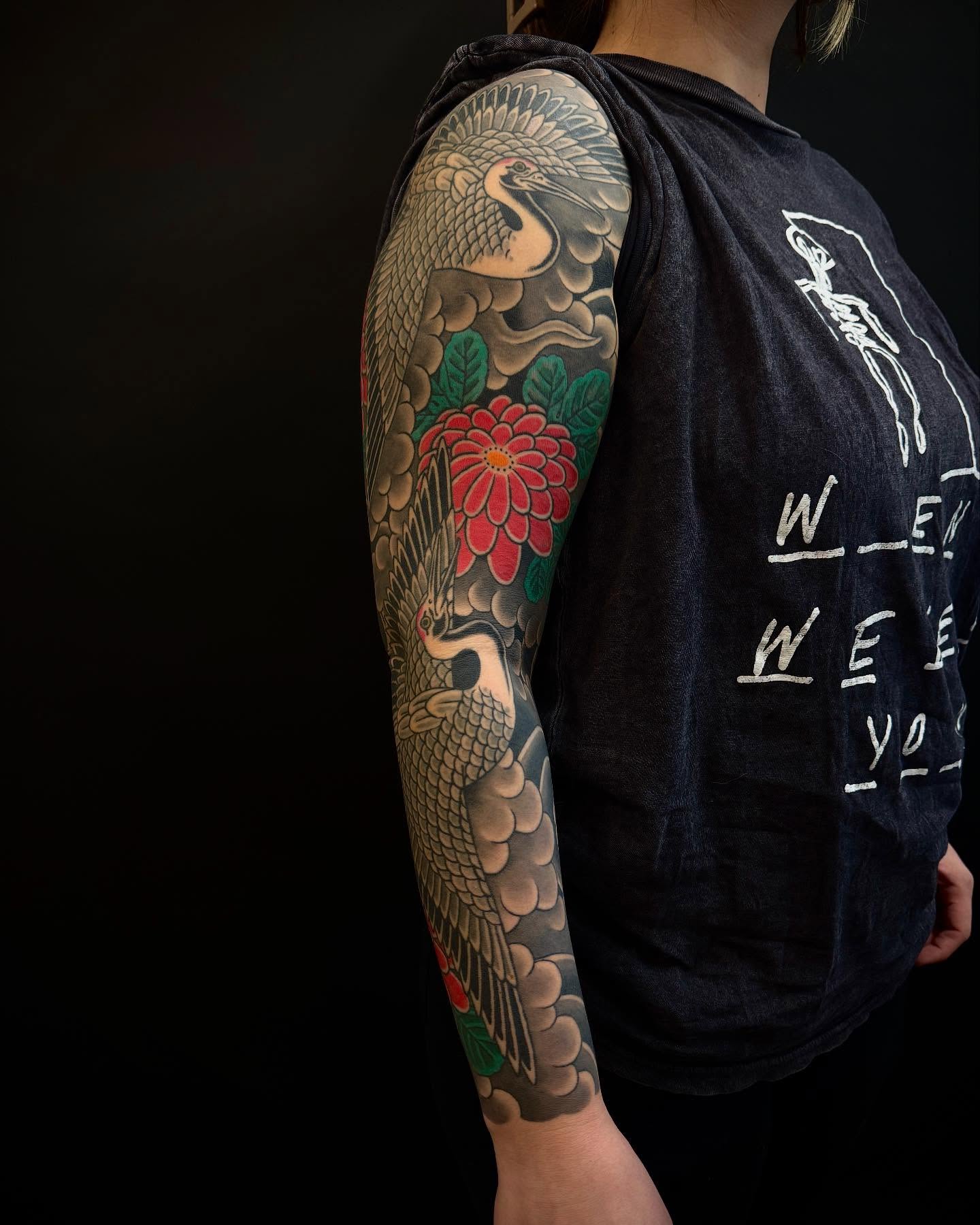 Crane and chrysanthemum japanese irezumi tattoo on the upper arm by Cole Pittman Memphis Tattoo artist, Memphis, Tennessee