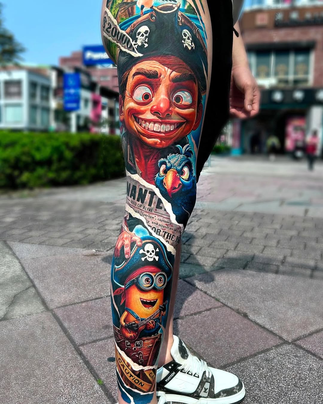 Pirate characters and wanted poster watercolor tattoo on the forearm by Bình Nguyễn