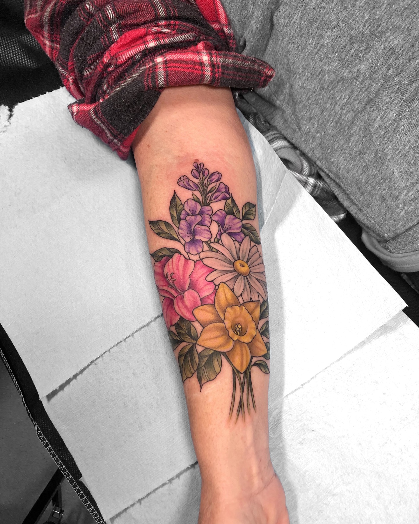 Floral bouquet realism tattoo on the forearm by 𝔍𝔢𝔫𝔫𝔦𝔢 𝔗𝔦𝔢𝔰𝔪𝔞𝔫