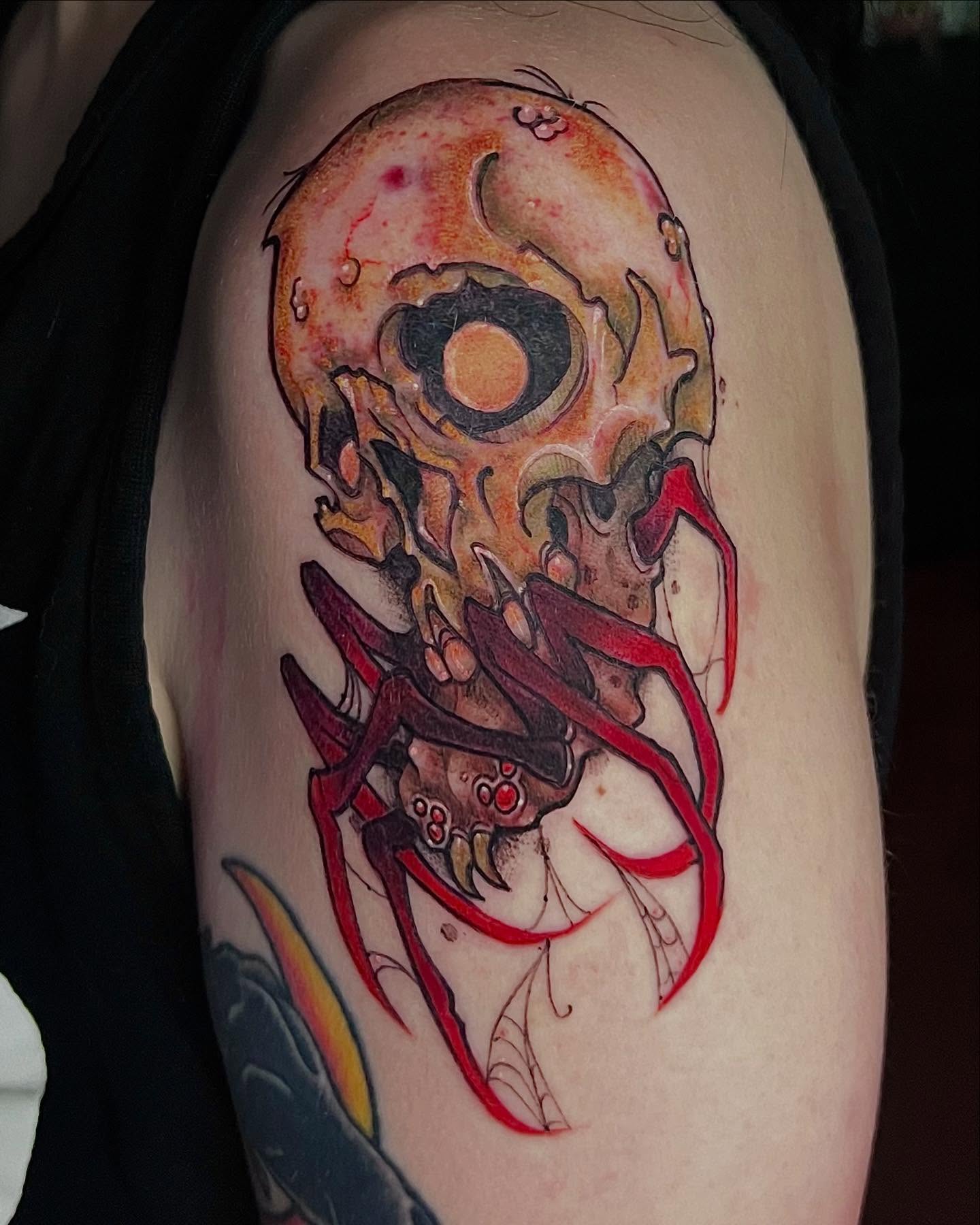 Cyborg skull dark realism tattoo on the shoulder by SJ Horvath