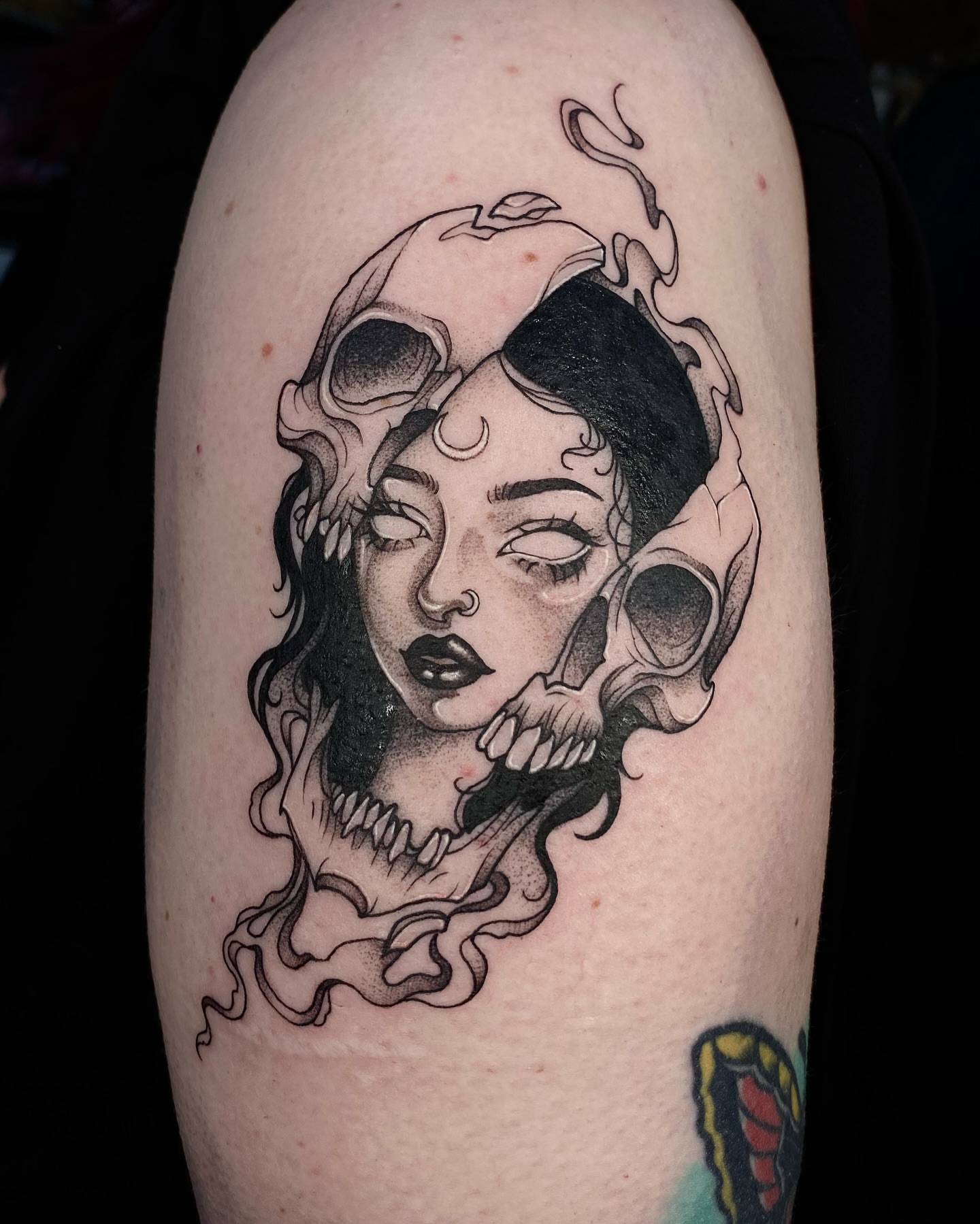 Woman with skulls realism tattoo on the forearm by IVY