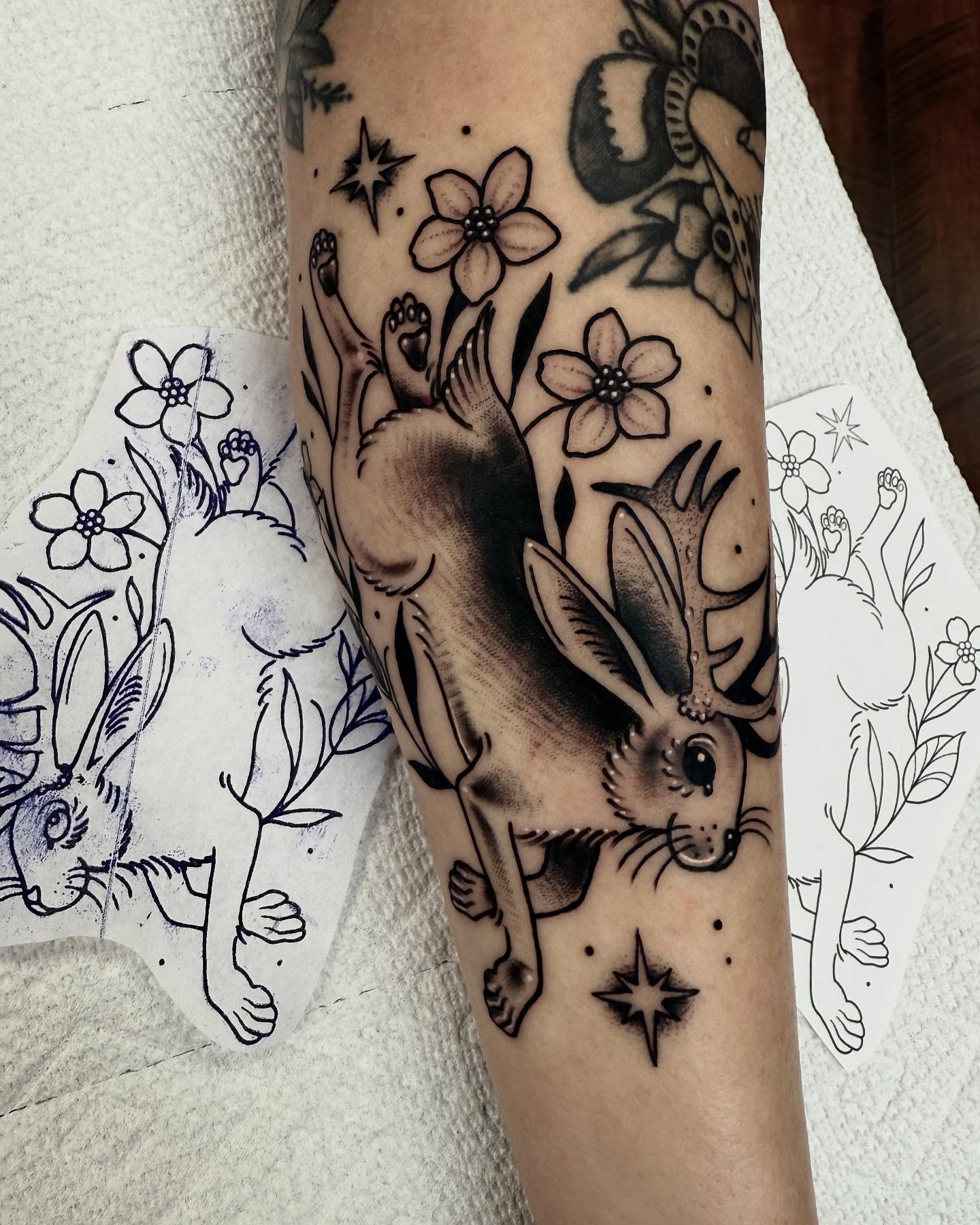 Rabbit and flowers American traditional tattoo on the forearm by ๐ท๐๐๐๐ ๐ฎ๐๐๐๐