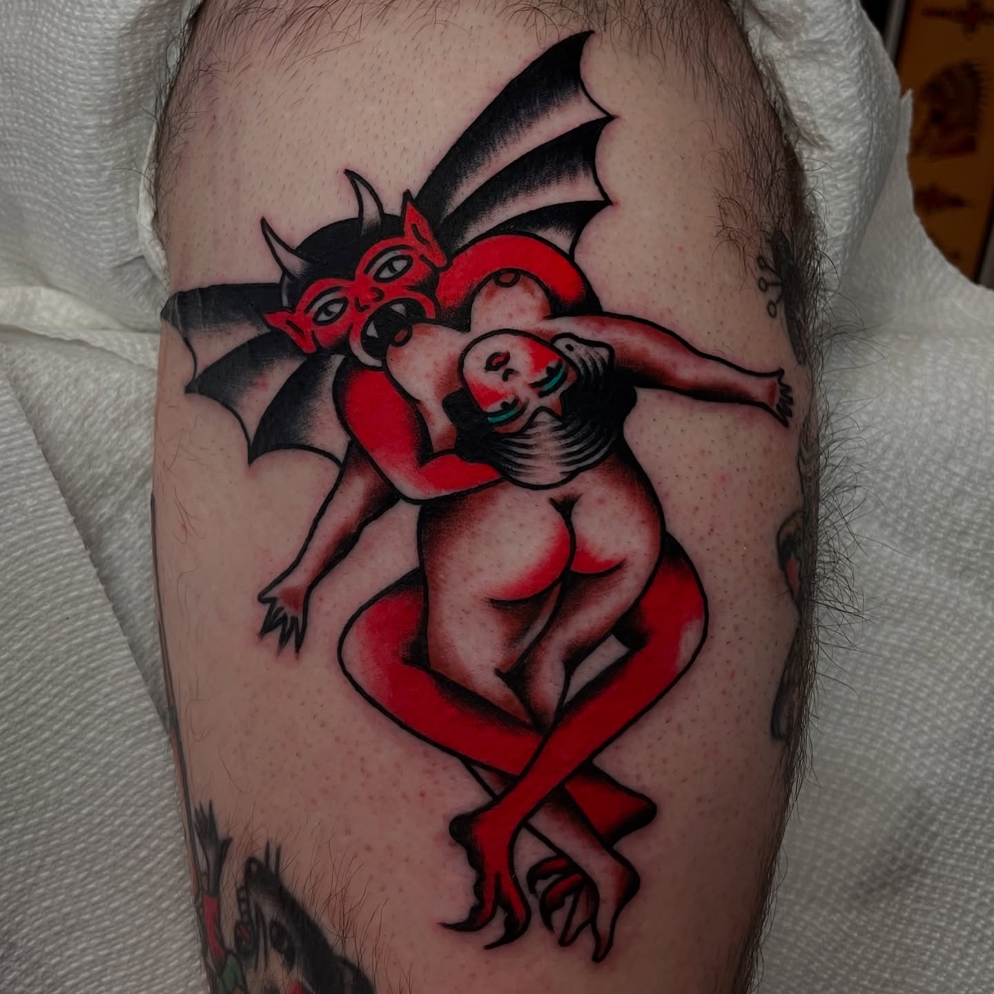 Devils American traditional tattoo on the thigh by Texas Jonah