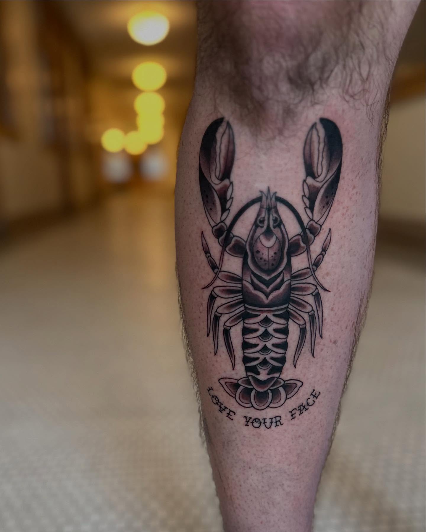 Lobster black and grey tattoo on the calf by Abigail Townsend