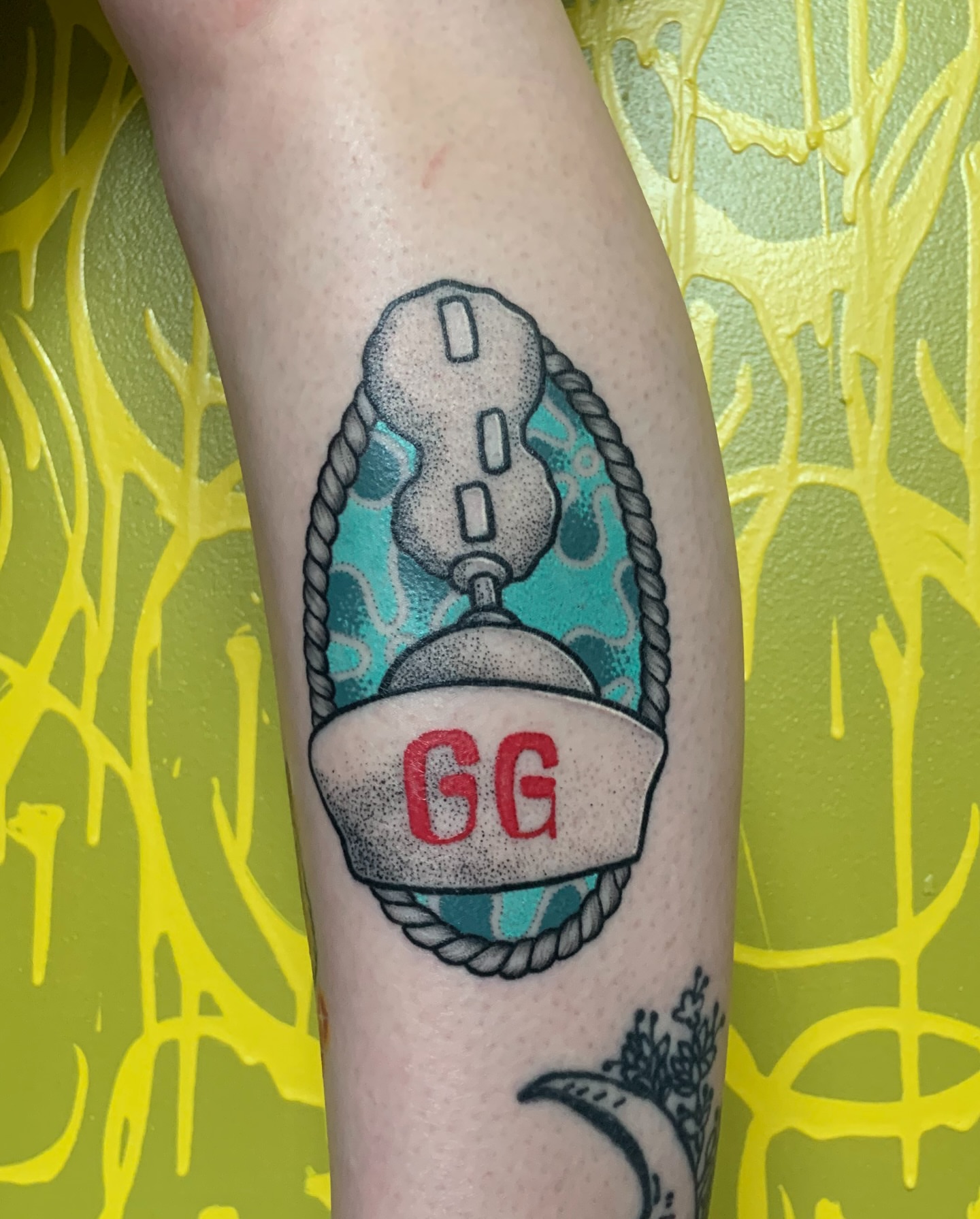 Buoy American traditional tattoo on the forearm by Bombay Pain Co.